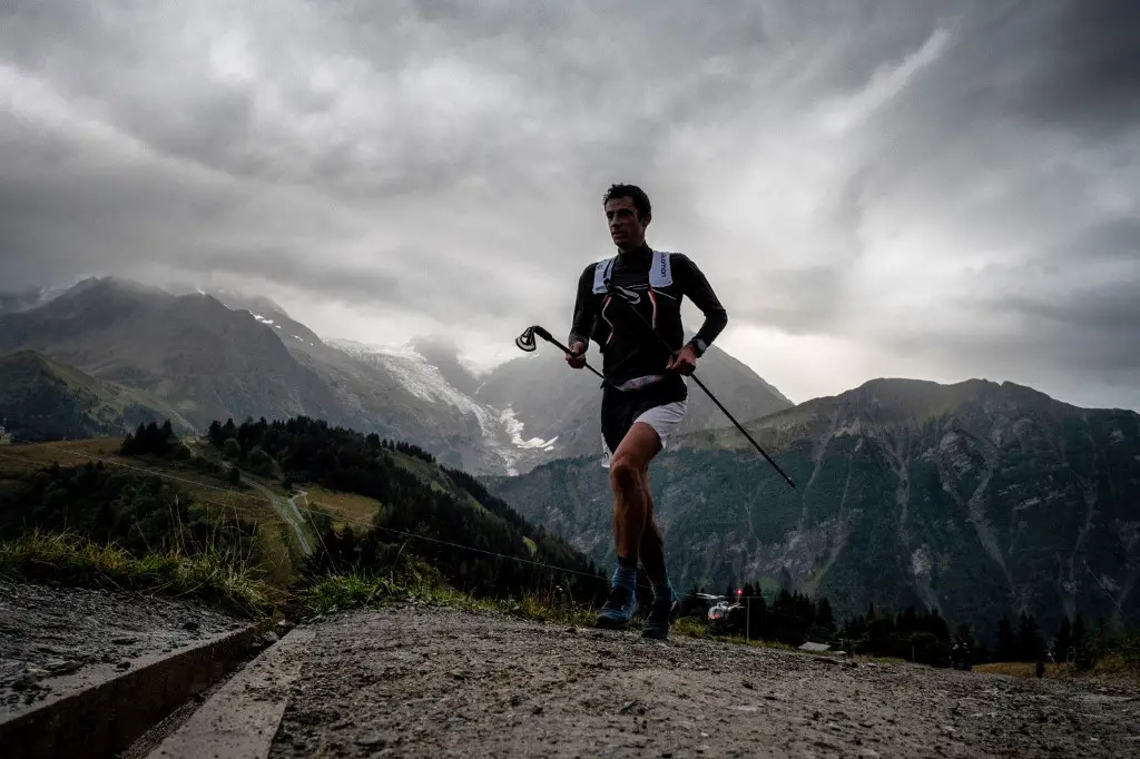 Spanish ultra trailer Kilian Jornet runs at the Voza path as he competes in the 170km Ultra-Trail of Mont-Blanc (UTMB) race around the Mont-Blanc, crossing France, Italy and Switzerland, on August 31, 2018 in Saint Gervais Les Bains. - The 16th Ultra-Trail du Mont-Blanc (UTMB), a mountain ultramarathon with numerous passages in high altitude (>2500m) and in difficult weather conditions (night, wind, cold, rain or snow), takes place once a year in the Alps, across France, Italy and Switzerland. (Photo by JEFF PACHOUD / AFP)