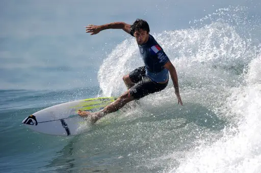 France's Jeremy Flores performs a manoeuvre on a wave during the World Surf League men's championship tour surfing event at Keramas in Gianyar on Indonesia's resort island of Bali on May 19, 2019. (Photo by SONNY TUMBELAKA / AFP)