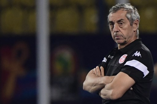 Tunisia's coach Alain Giresse looks on during the 2019 Africa Cup of Nations (CAN) Round of 16 football match between Ghana and Tunisia at the Ismailia Stadium in the Egyptian city on July 8, 2019. (Photo by JAVIER SORIANO / AFP)