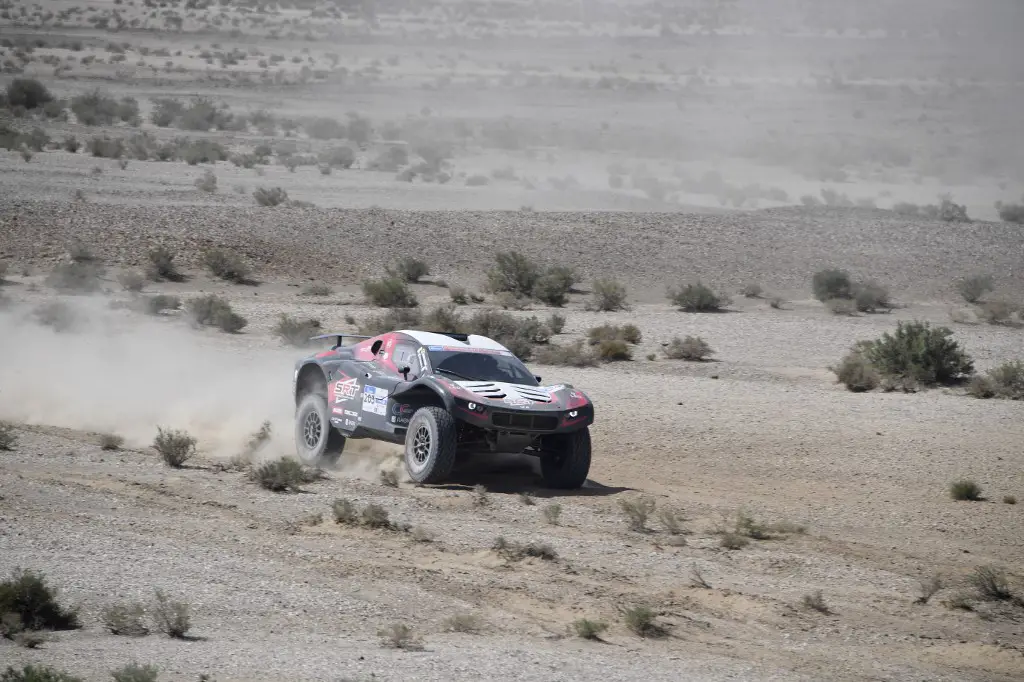 Mathieu Serradori of France and Fabian Lurquin of Belgium in their Buggy Mathieu Serradori compete during the tenth stage of the Silk Way Rally 2019 from Jiayuguan to Dunhuang in China's Gansu province on July 16, 2019. (Photo by Damien MEYER / AFP)