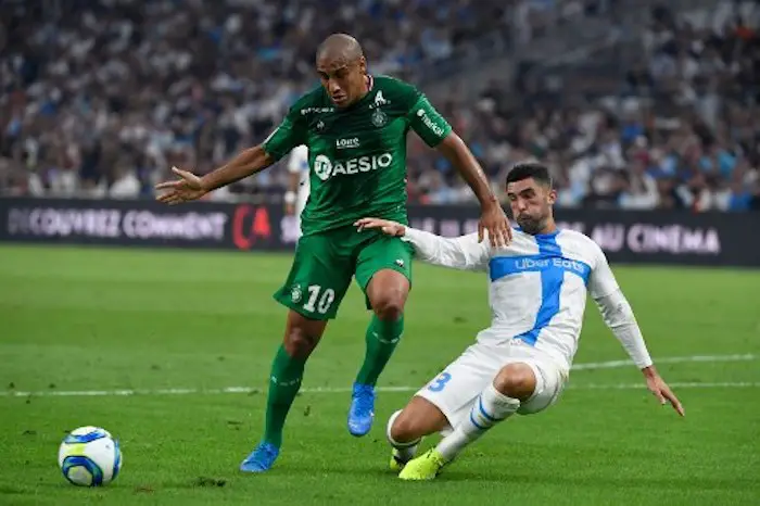 Saint-Etienne's Tunisian midfielder Wahbi Khazri (L) vies vies Marseille's Spanish defender Alvaro Gonzalez during the French L1 football match between Marseille (OM) and Saint-Etienne (ASSE) at the Velodrome Stadium in Marseille, southeastern France, on September 1, 2019. (Photo by Christophe SIMON / AFP)