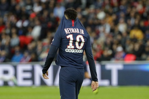 Paris Saint-Germain's Brazilian forward Neymar reacts during the French L1 football match between Paris Saint-Germain and Angers SCO at the Parc des Princes stadium in Paris on October 5, 2019. (Photo by GEOFFROY VAN DER HASSELT / AFP)