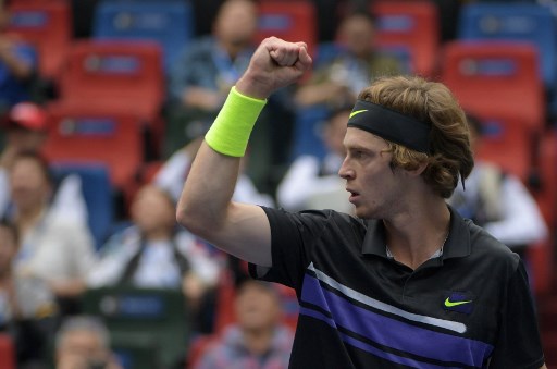 Andrey Rublev of Russia reacts while playing against Borna Coric of Croatia during their first round men's singles match at the Shanghai Masters tennis tournament in Shanghai on October 8, 2019. (Photo by NOEL CELIS / AFP)