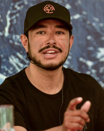 (FILES) In this file photo taken on May 28, 2019, mountaineer Nirmal Purja speaks during a press conference in Kathmandu. - Nepali climber, Nirmal Purja is on track to make climbing history after Chinese authorities granted him a permit on October 15 for the final mountain of his 14-peak record. (Photo by PRAKASH MATHEMA / AFP)
