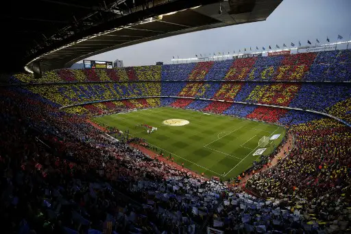 (FILES) In this file photo taken on May 06, 2018 A general view shows the Spanish league football match between FC Barcelona and Real Madrid CF at the Camp Nou stadium in Barcelona on May 6, 2018. - Spanish league asks on October 16, 2019, for El Clasico to be switched to Madrid over Catalan protests. (Photo by Pau Barrena / AFP)