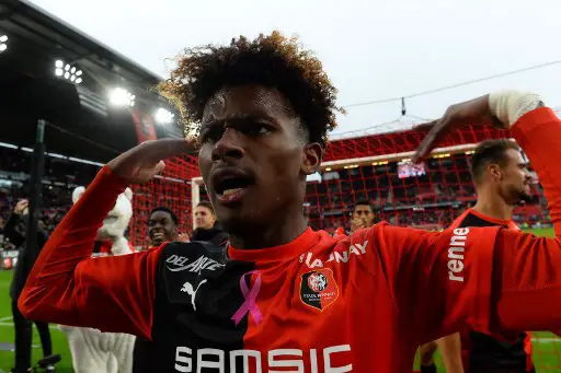 Rennes' French midfielder Yann Gboho celebrates after scoring his team's third goal during the French L1 football match between Stade Rennais Football Club and Toulouse Football Club at the Roazhon Park, in Rennes, northwestern France on October 27, 2019. (Photo by JEAN-FRANCOIS MONIER / AFP)