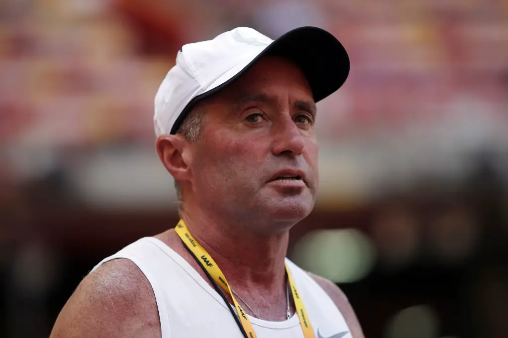Cuban-American coach Alberto Salazar attends a practice session ahead of the 2015 IAAF World Championships at the "Bird's Nest" National Stadium in Beijing on August 21, 2015. AFP PHOTO / ADRIAN DENNIS (Photo by ADRIAN DENNIS / AFP)