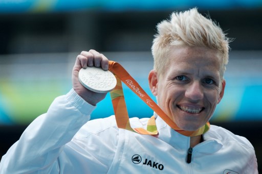 Belgium's Marieke Vervoort reacts on the podium after receiving the silver medal for the women's 400 m (T52) of the Rio 2016 Paralympic Games at the Olympic Stadium in Rio de Janeiro on September 10, 2016. (Photo by YASUYOSHI CHIBA / AFP)