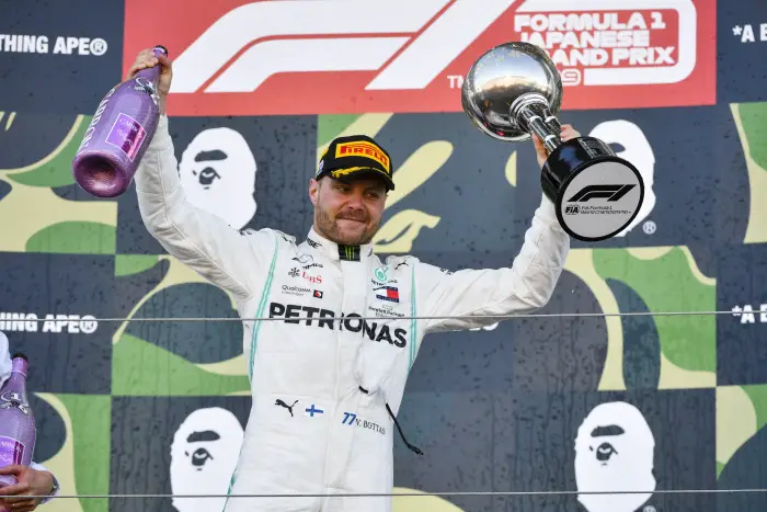 Race winner Valtteri Bottas, Mercedes AMG F1 celebrates n the podium with the trophy and the champagne