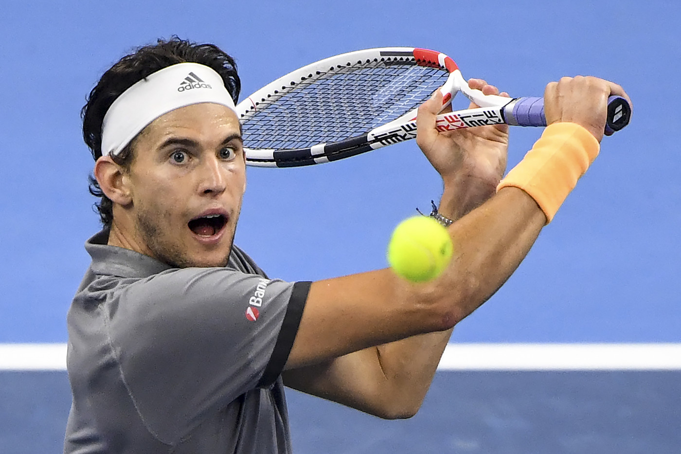 Dominic Thiem of Austria hits a return during his men's singles final match against Stefanos Tsitsipas of Greece at the China Open tennis tournament in Beijing on October 6, 2019.