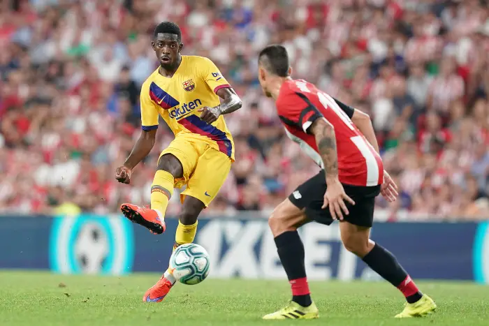 Athletic de Bilbao's Dani Garcia (r) and FC Barcelona's Ousmane Dembele during La Liga match. August 16,2019.
