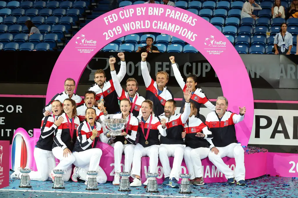 French team celebrate winning the Fed Cup final tennis competition between Australia and France in Perth on November 10, 2019. (Photo by Tony Ashby / AFP) / / IMAGE RESTRICTED TO EDITORIAL USE - STRICTLY NO COMMERCIAL USE