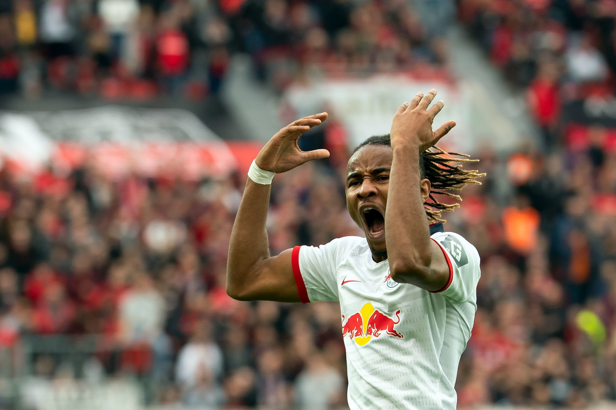 05 October 2019, North Rhine-Westphalia, Leverkusen: Soccer: Bundesliga, Bayer Leverkusen - RB Leipzig, 7th matchday in the BayArena: Leipzig's Christopher Nkunku cheers his goal to 1:1. Photo: Federico Gambarini/dpa - IMPORTANT NOTE: In accordance with the requirements of the DFL Deutsche Fu?ball Liga or the DFB Deutscher Fu?ball-Bund, it is prohibited to use or have used photographs taken in the stadium and/or the match in the form of sequence images and/or video-like photo sequences. ..Photo by Icon Sport - Christopher NKUNKU - BayArena - Leverkusen (Allemagne)