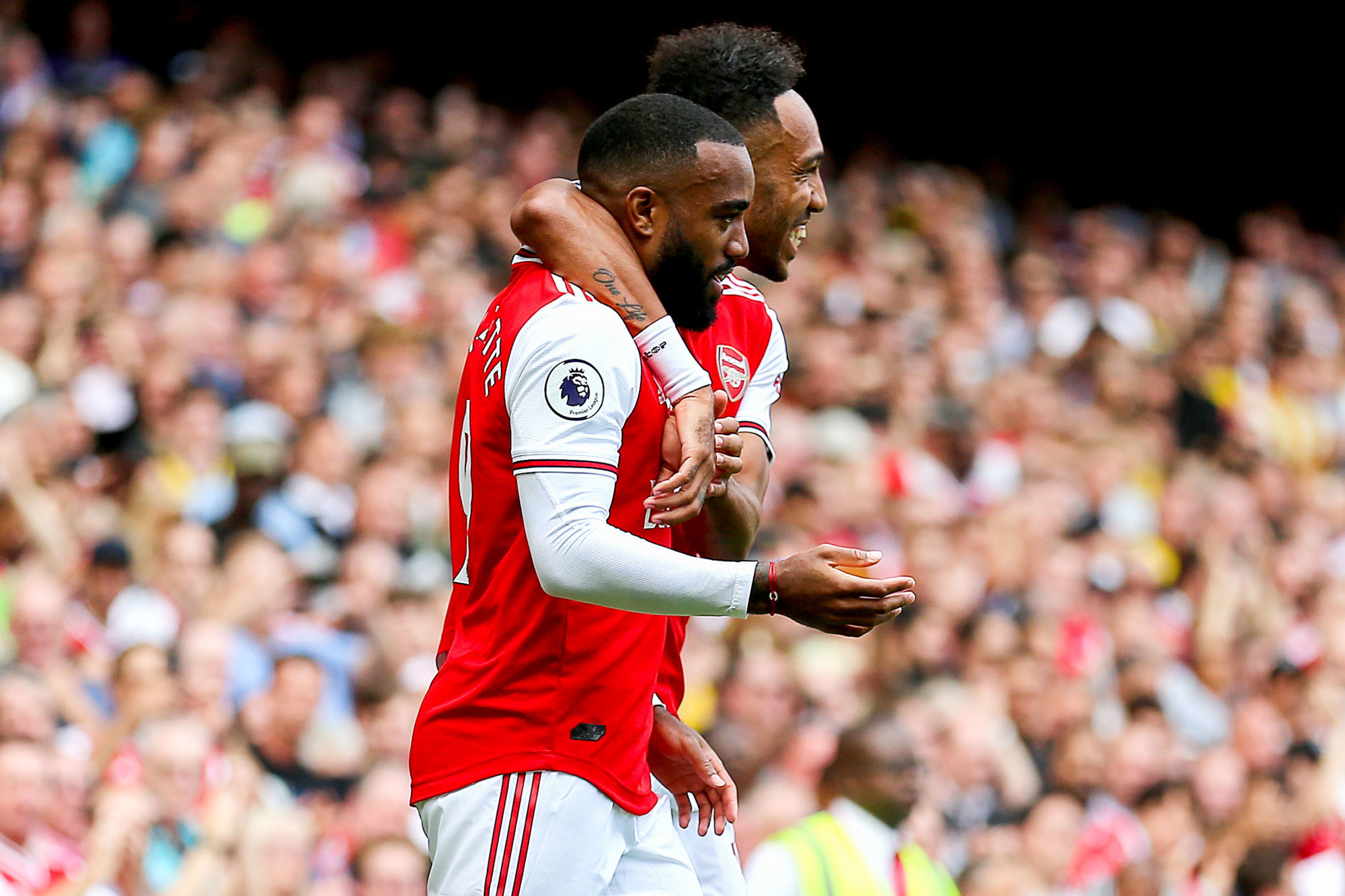 Arsenal's Alexandre Lacazette (left) celebrates scoring his side's first goal of the game with team-mate Pierre-Emerick Aubameyang (right) during the Premier League match at The Emirates Stadium, London. On August 17th, 2019. Photo : PA Images / Icon Sport