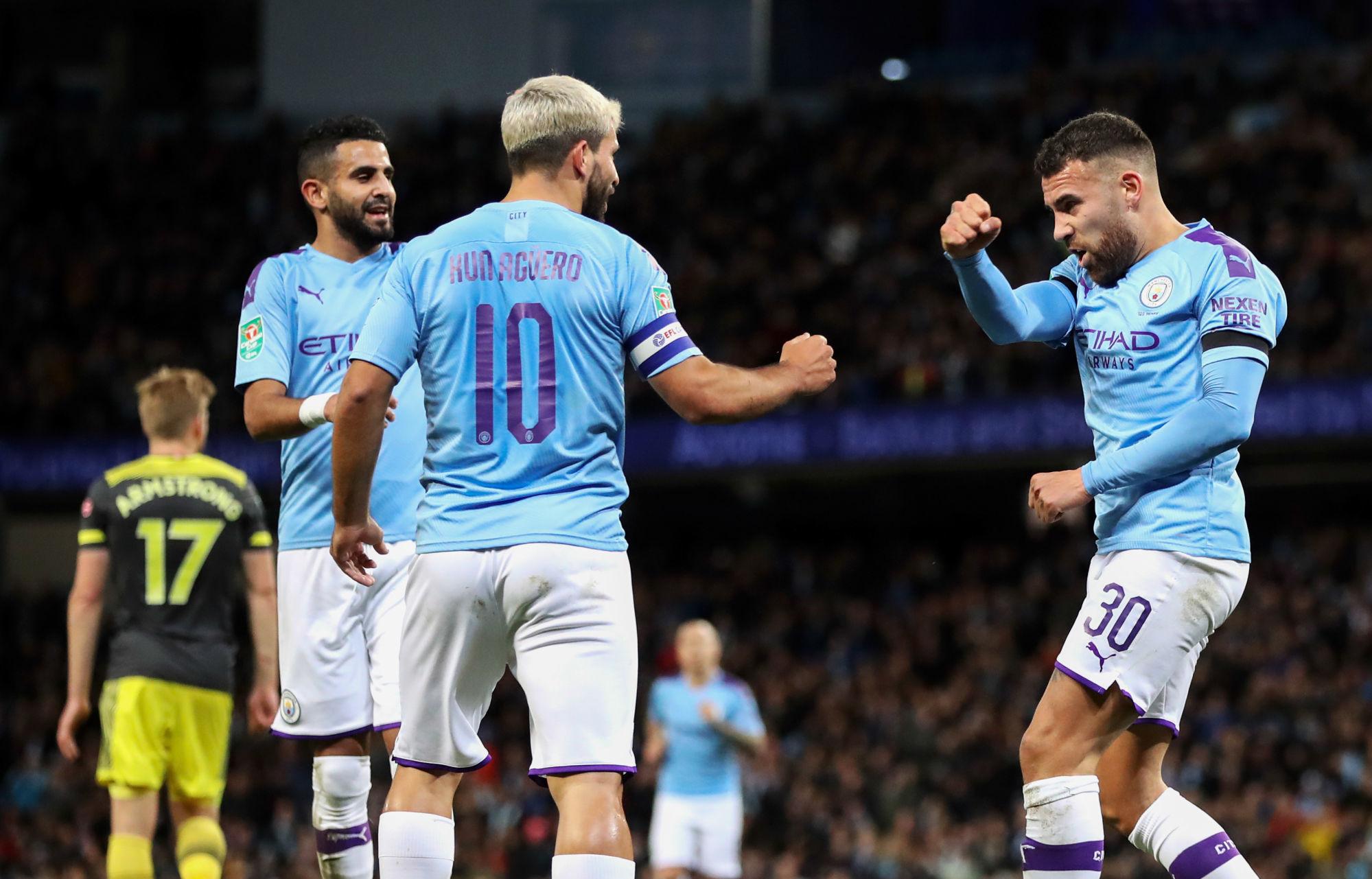 Manchester City's Nicolas Otamendi (right) celebrates scoring his side's first goal of the game during the Carabao Cup, Fourth Round match at the Etihad Stadium, Manchester. 

Photo by Icon Sport - Nicolas OTAMENDI - Etihad Stadium - Manchester (Angleterre)