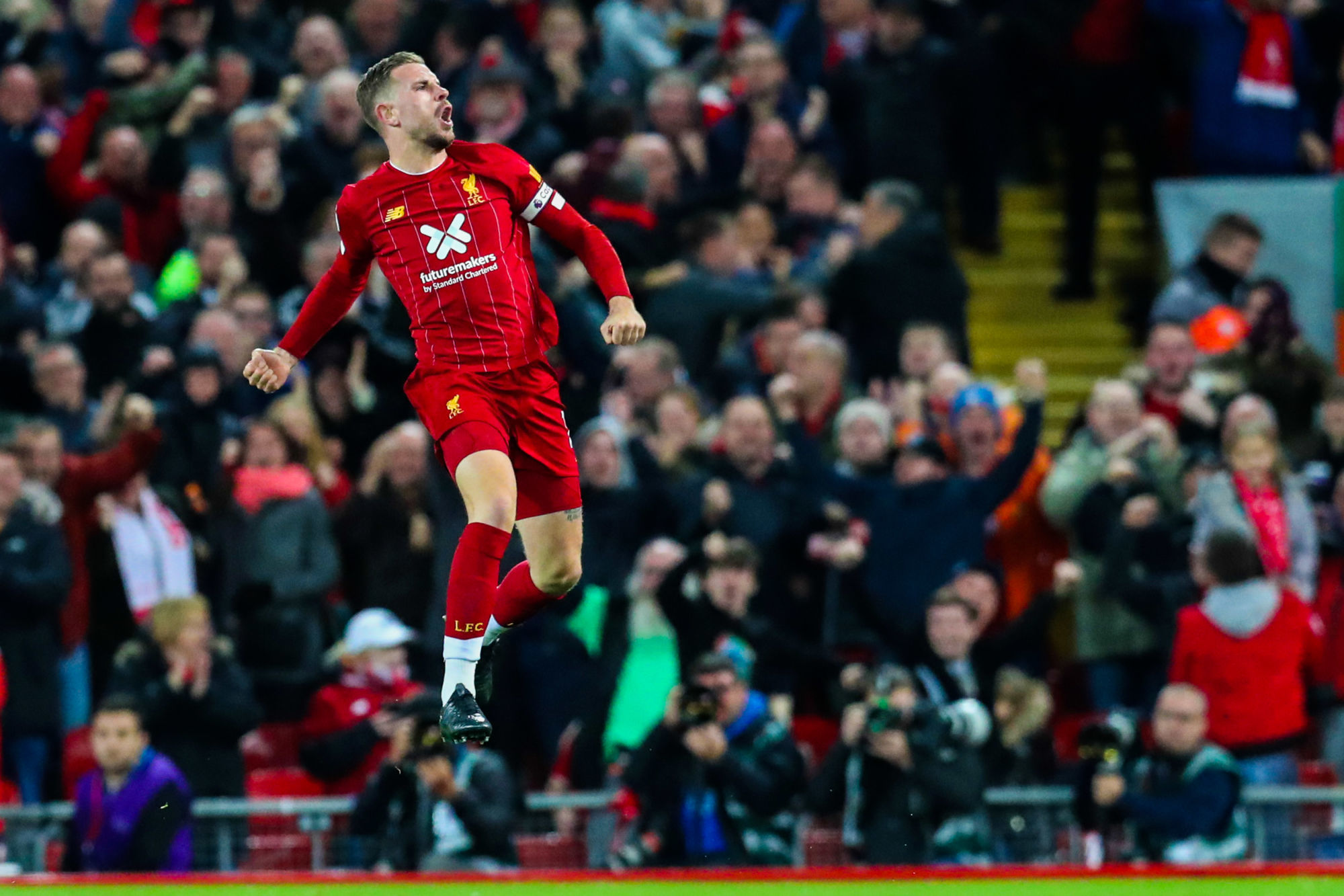 27th October 2019; Anfield, Liverpool, Merseyside, England; English Premier League Football, Liverpool versus Tottenham Hotspur; Jordan Henderson of Liverpool leaps and punches the air after scoring his team's equalising goal after 52 minutes - Strictly Editorial Use Only. No use with unauthorized audio, video, data, fixture lists, club/league logos or 'live' services. Online in-match use limited to 120 images, no video emulation. No use in betting, games or single club/league/player publications 


Photo by Icon Sport - Jordan HENDERSON - Anfield Road - Liverpool (Angleterre)
