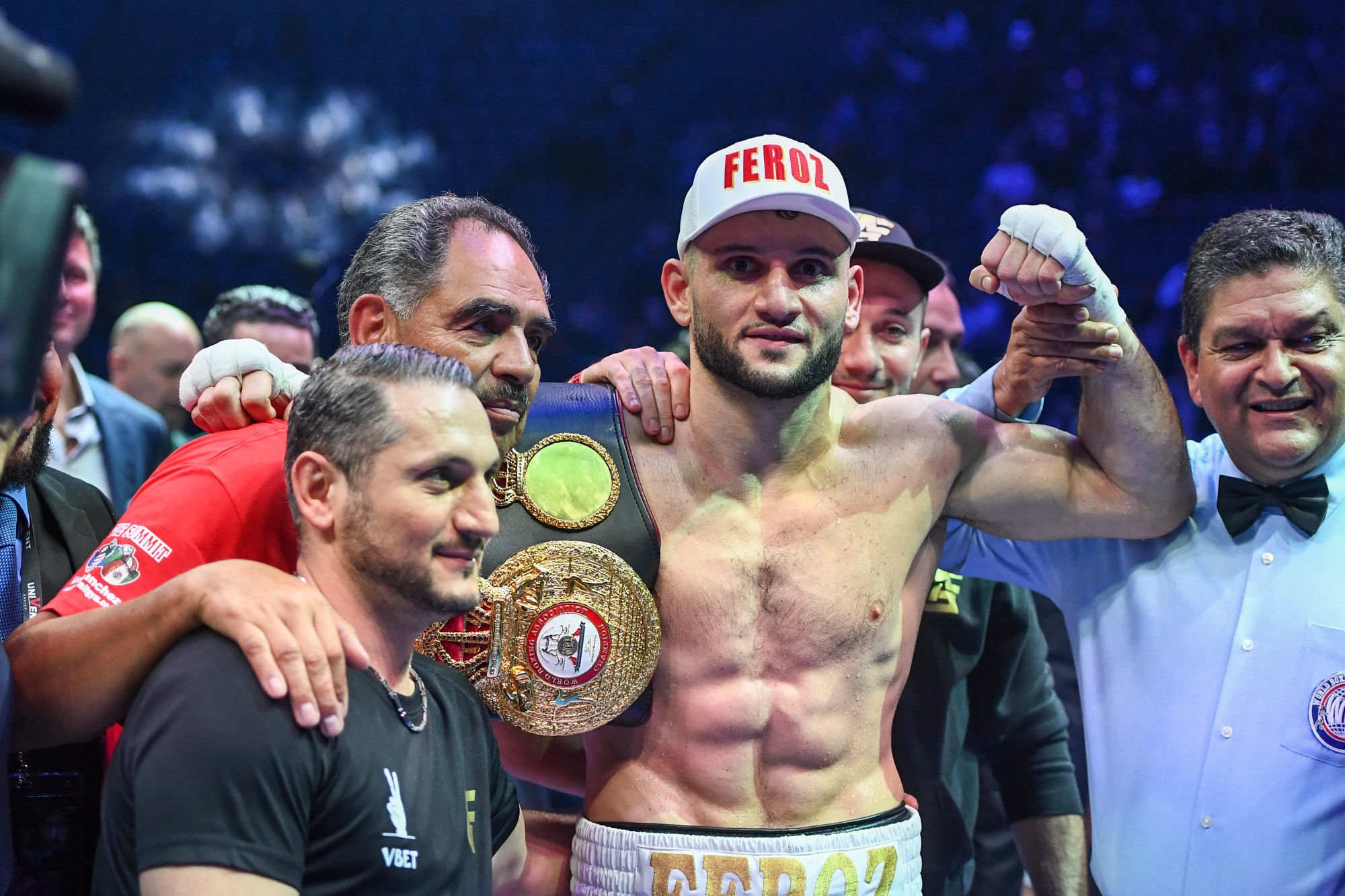 Arsene GOULAMIRIAN of France celebrates the victory with his coach during the WBA Lightweight World Championship on November 15, 2019 in Paris, France. (Photo by Anthony Dibon/Icon Sport) - Arsene GOULAMIRIAN -