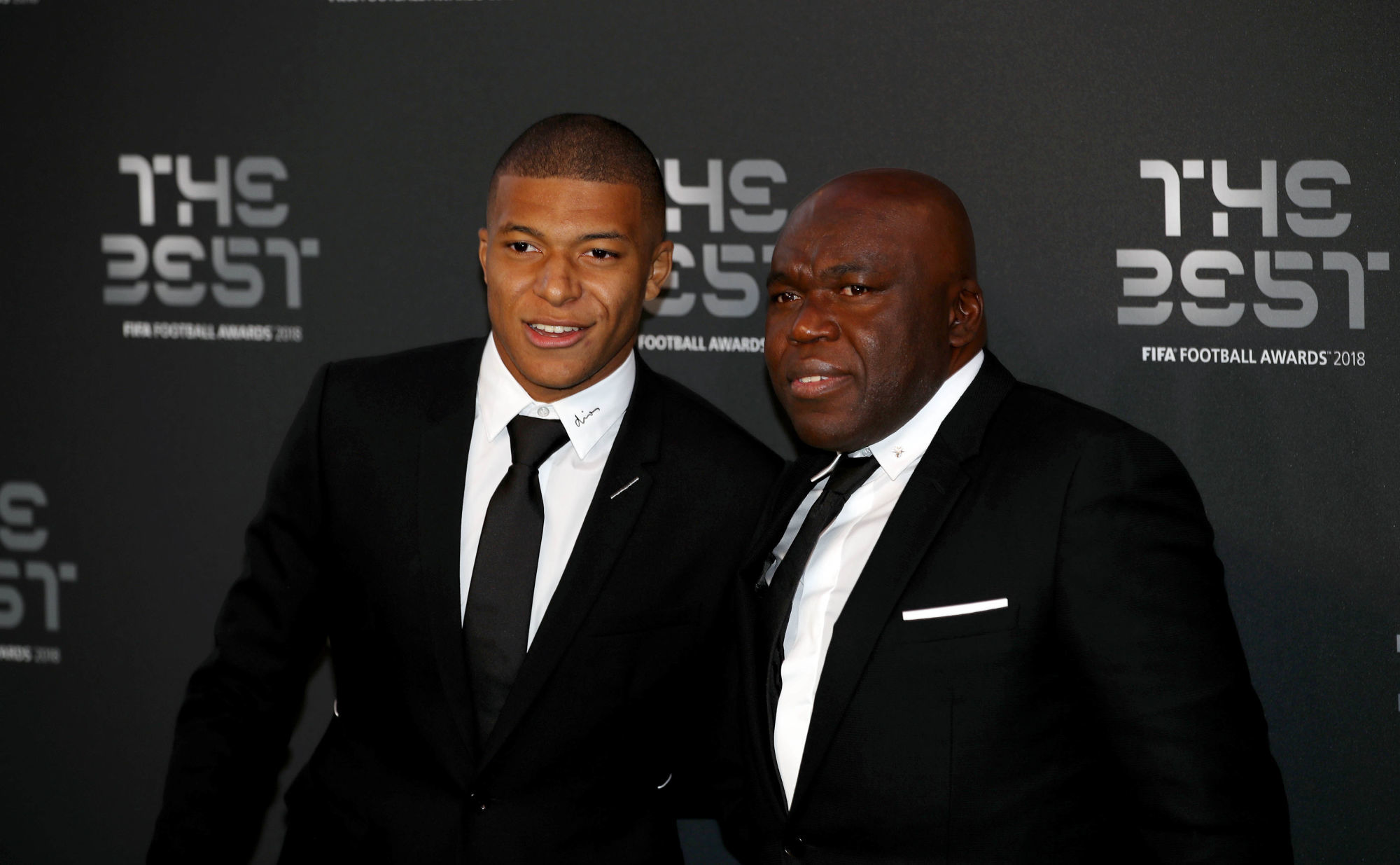 Kylian Mbappe and Wilfried Mbappe (right) during the Best FIFA Football Awards 2018 at the Royal Festival Hall, London.  Best FIFA Football Awards 2018 at the Palladium Theatre, London on 24 September 2018 Photo : PA Images / Icon Sport