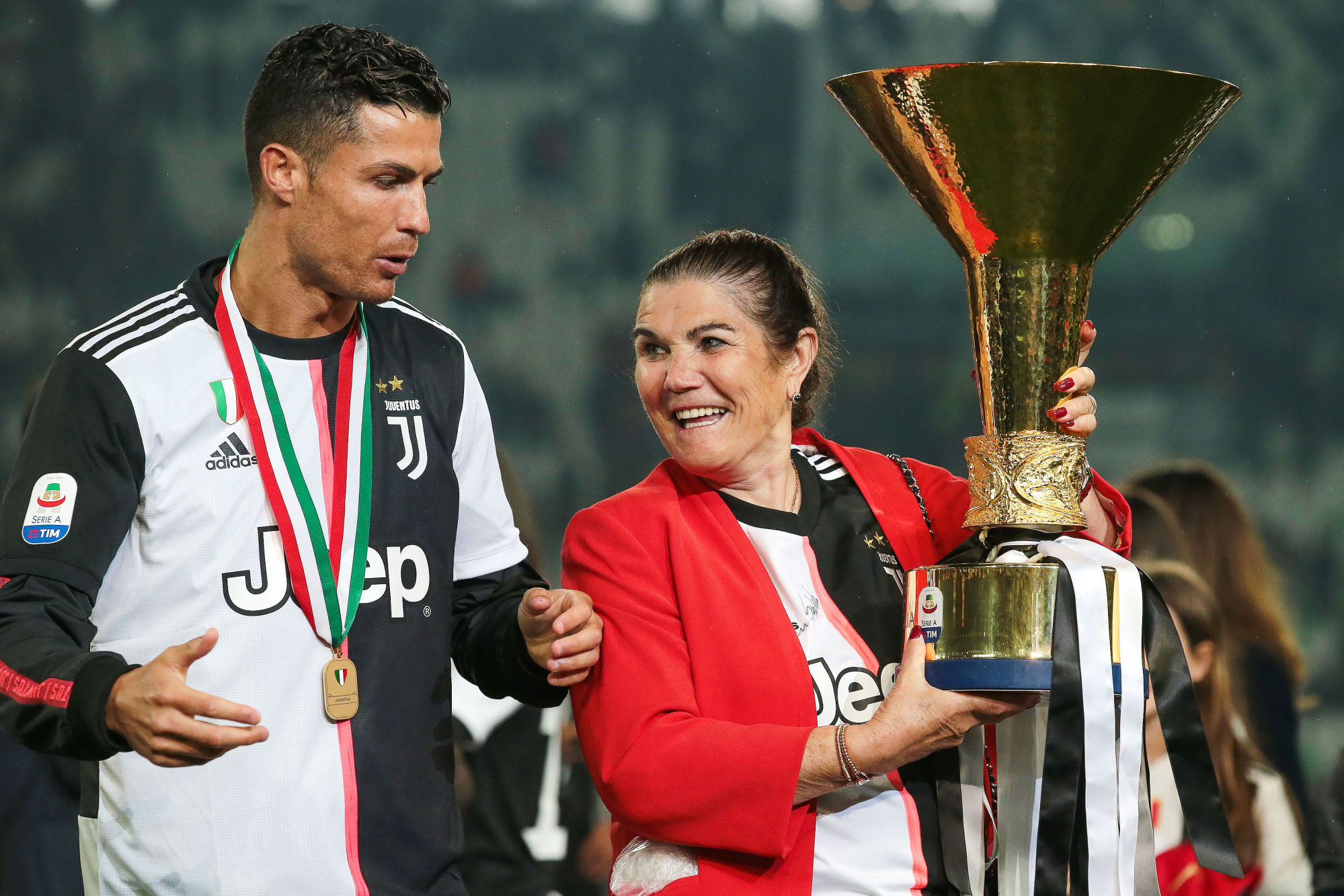 Cristiano Ronaldo of Juventus and his mother Maria Dolores dos Santos Aveiro pictured with the trophy following the Serie A match at Allianz Stadium, Turin. Picture date: 19th May 2019. Photo : Spi / Icon Sport