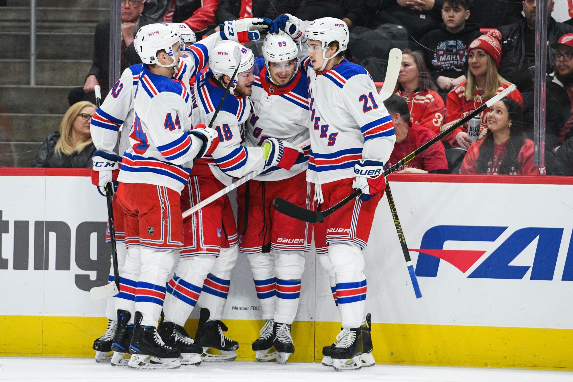 Mar 7, 2019; Detroit, MI, USA; New York Rangers right wing Pavel Buchnevich (89) celebrates his goal with defenseman Neal Pionk (44) defenseman Libor Hajek (43) left wing Brendan Lemieux (48) and center Brett Howden (21) during the first period against the Detroit Red Wings at Little Caesars Arena. Photo : SUSA / Icon Sport