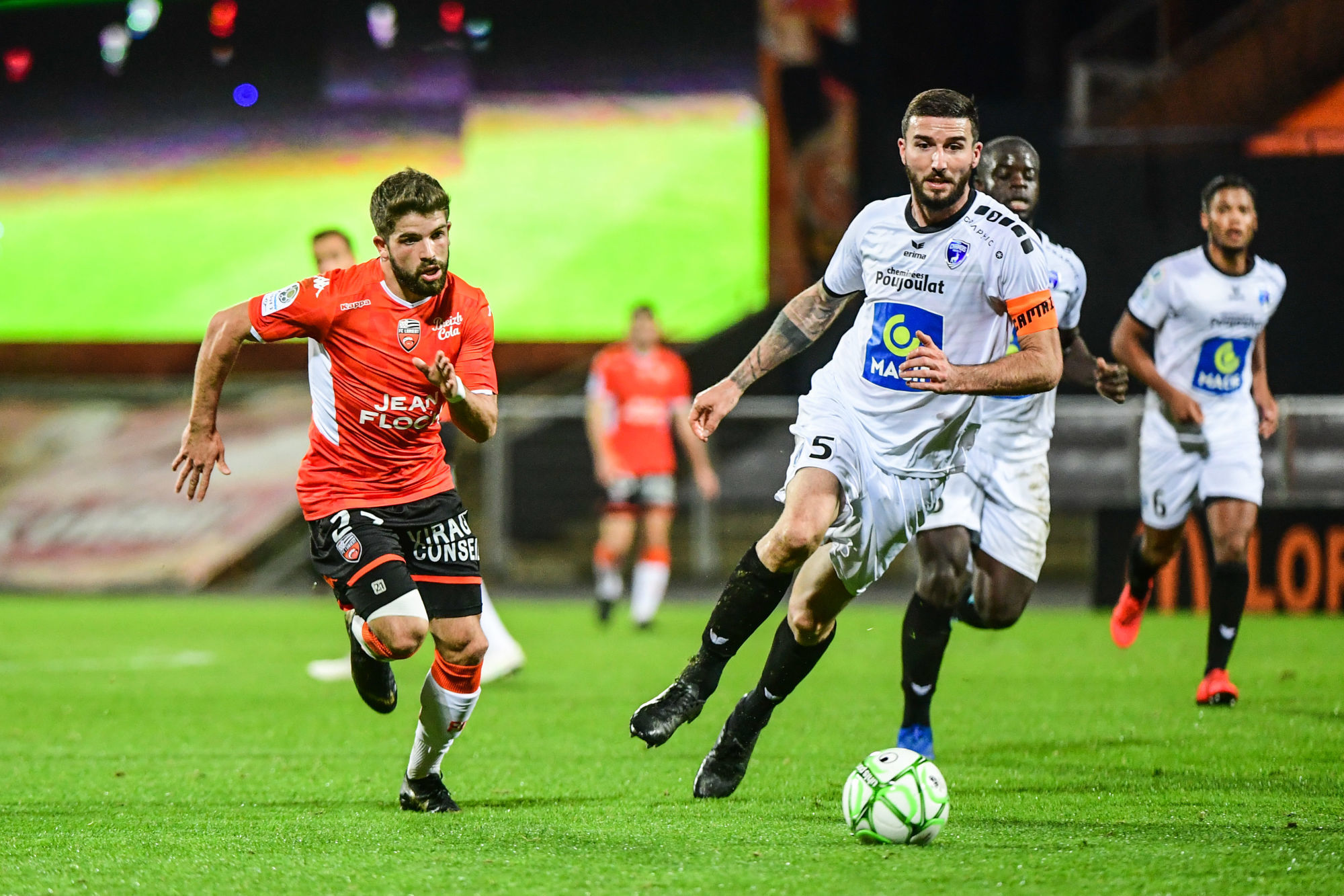 Jimmy CABOT of Lorient and Matthieu SANS of Niort during the Ligue 2 match between Lorient and Niort on November 8, 2019 in Lorient, France. (Photo by Anthony Dibon/Icon Sport) - Capitainerie du Port de Lorient La Base - Lorient (France)