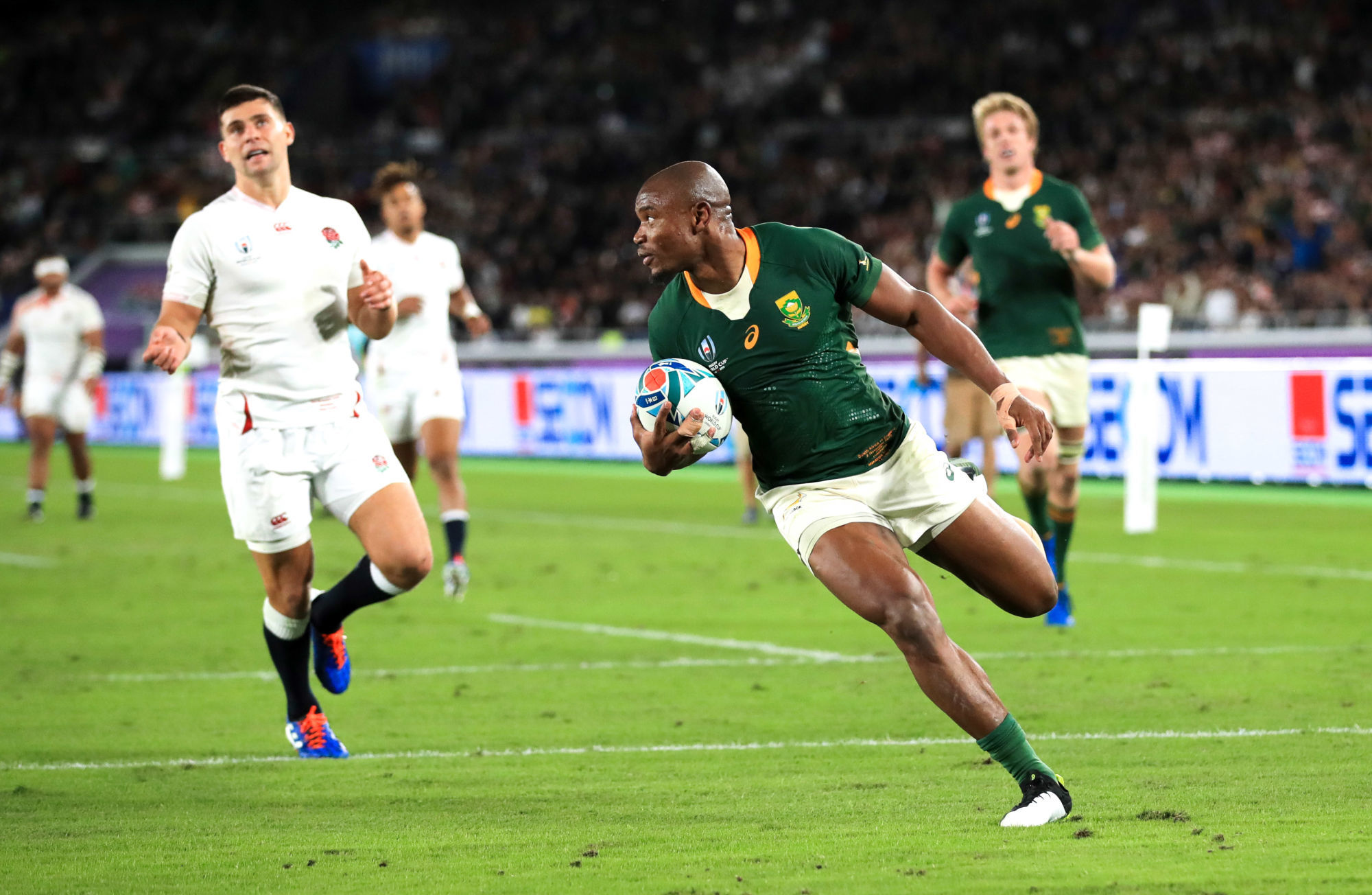South Africa's Makazole Mapimpi scores his sides first try during the 2019 Rugby World Cup final match at Yokohama Stadium. 

Photo by Icon Sport - International Stadium Yokohama - Yokohama (Japon)