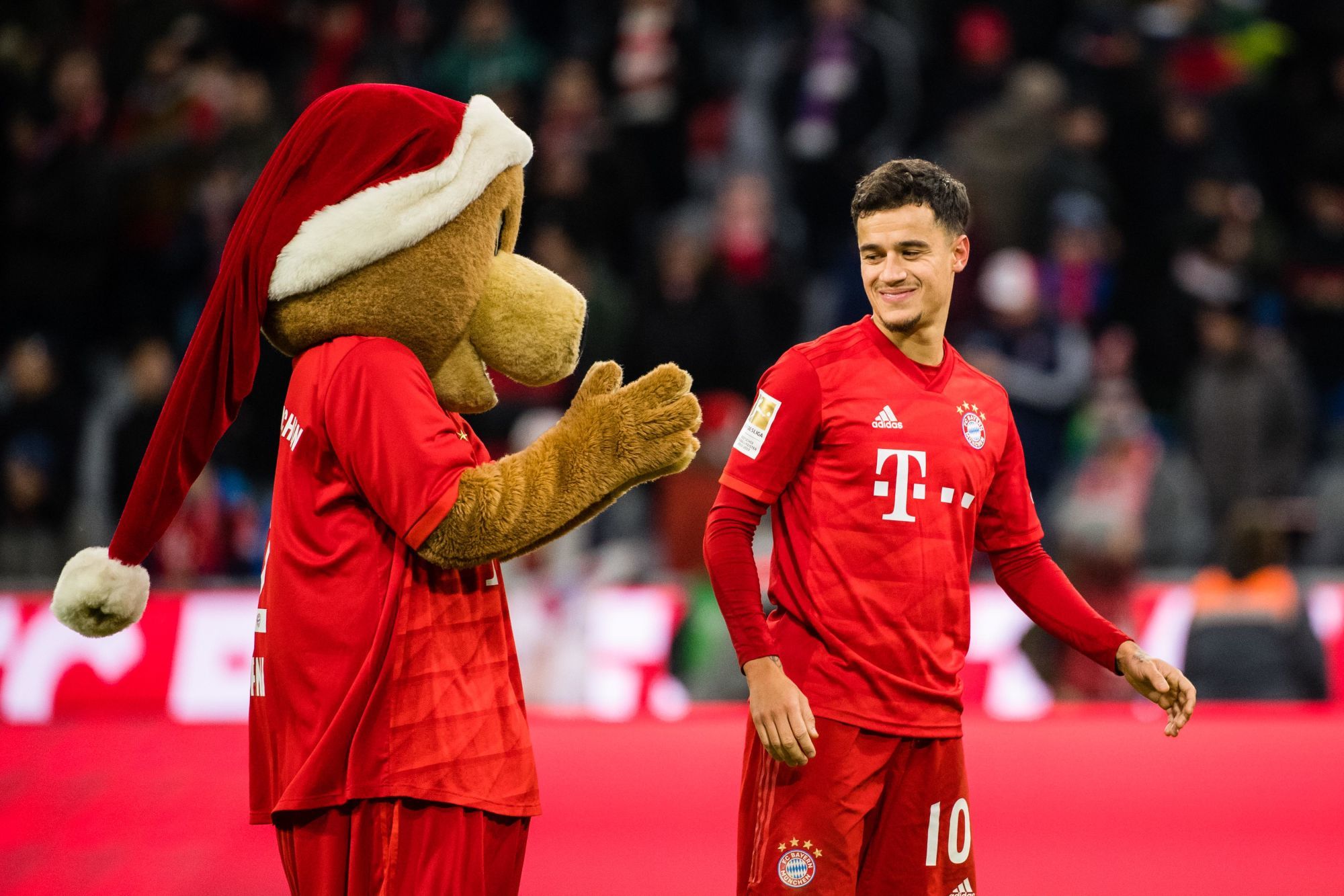 14 December 2019, Bavaria, Munich: Soccer: Bundesliga, Bayern Munich - Werder Bremen, 15th matchday in the Allianz Arena. Philippe Coutinho of FC Bayern Munich rejoices with mascot Berni about the 6:1 victory after the end of the game. Photo: Matthias Balk/dpa - IMPORTANT NOTE: In accordance with the requirements of the DFL Deutsche Fu?ball Liga or the DFB Deutscher Fu?ball-Bund, it is prohibited to use or have used photographs taken in the stadium and/or the match in the form of sequence images and/or video-like photo sequences. 





Photo by Icon Sport - Philippe COUTINHO - Allianz Arena - Munich (Allemagne)