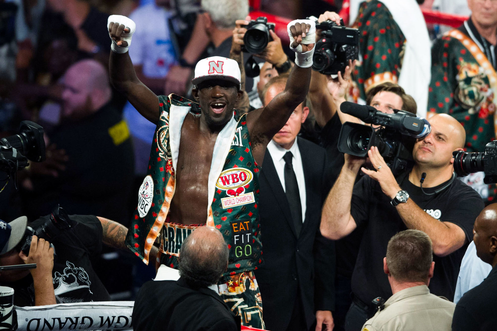 Terence Crawford of the United States celebrates after defeating Viktor Postol of Ukraine during their WBC WBO junior welterweight title unification boxing bout in Las Vegas, the United States, July 23, 2016. Terence Crawford won both the fight and a possible ticket into the Manny Pacquiao sweepstakes.   Photo : Avalon / Icon Sport