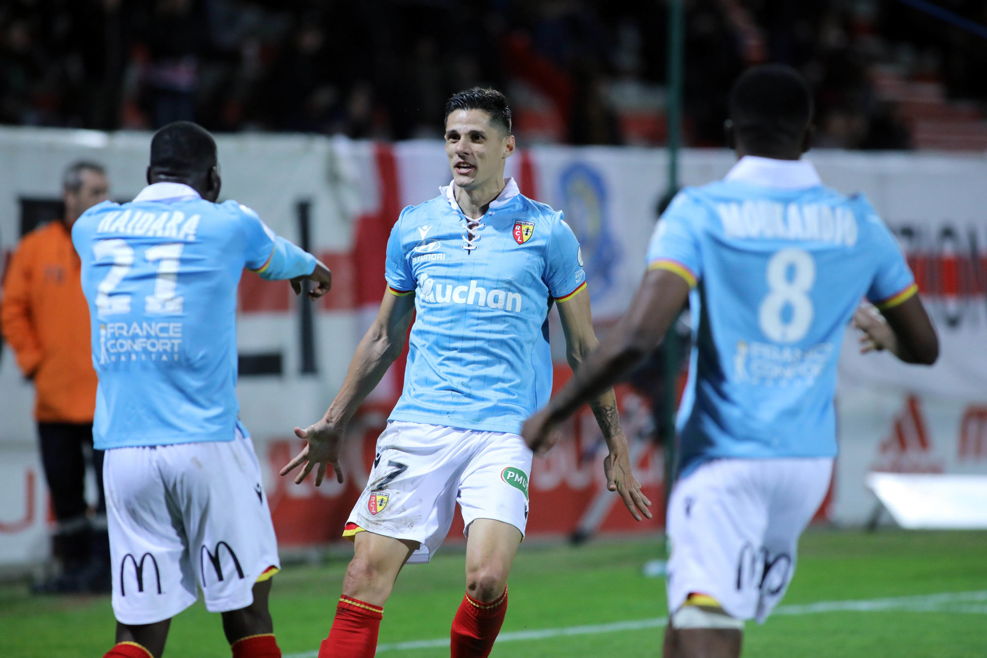 Florian SOTOCA of Lens celebrates his goal with Massadio HAIDARA  during the Ligue 2 match between Ajaccio and Lens at Stade Francois Coty on December 14, 2019 in Ajaccio, France. (Photo by Michel Luccioni/Icon Sport)  - Florian SOTOCA - Massadio HAIDARA - Stade François-Coty - Ajaccio (France)