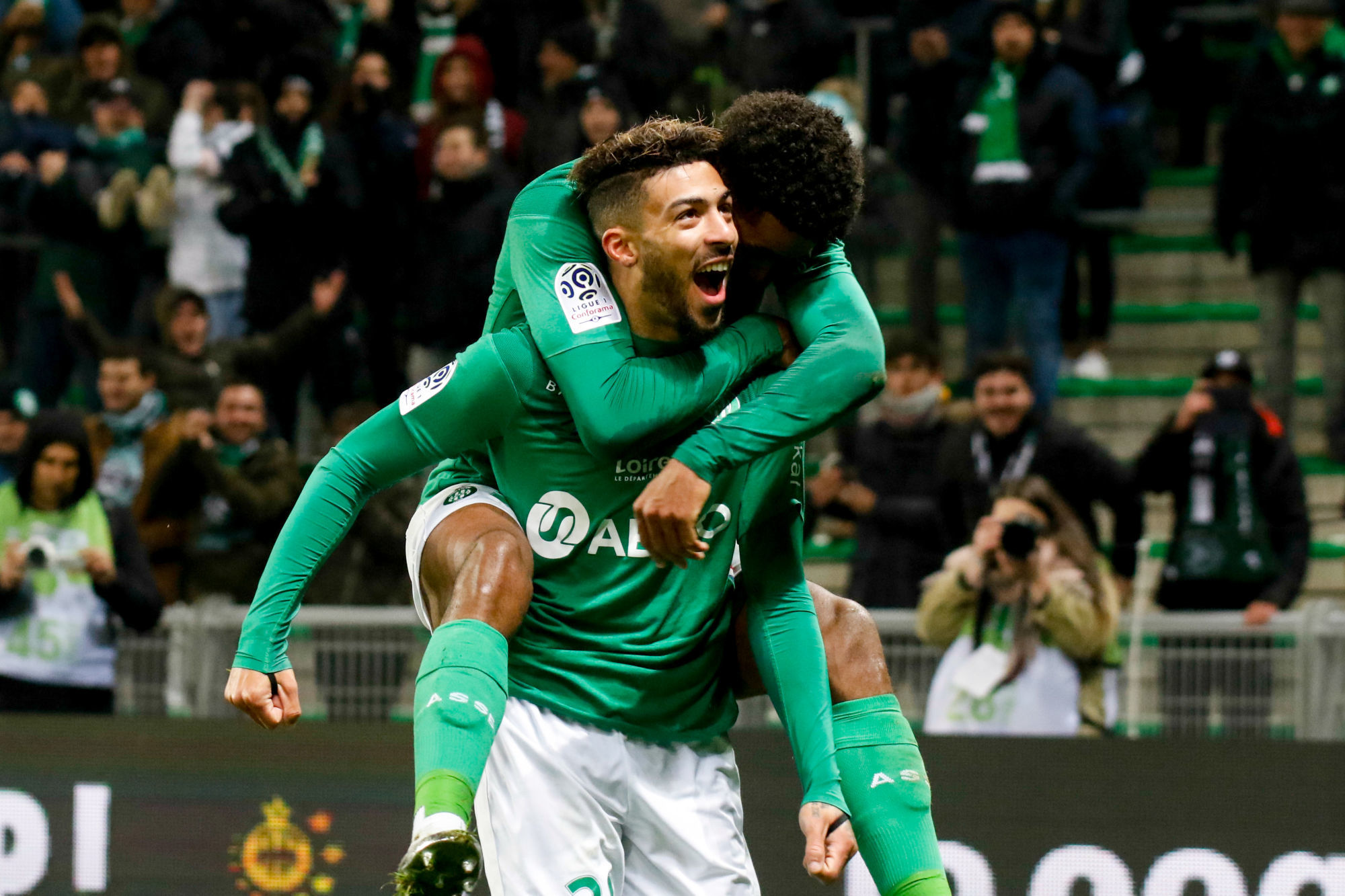 Denis BOUANGA of Saint Etienne celebrates his goal with Wesley FOFANA of Saint Etienne during the Ligue 1 match between AS Saint-Etienne and OGC Nice at Stade Geoffroy-Guichard on December 4, 2019 in Saint-Etienne, France. (Photo by Romain Biard/Icon Sport) - Denis BOUANGA - Wesley FOFANA - Stade Geoffroy-Guichard - Saint Etienne (France)