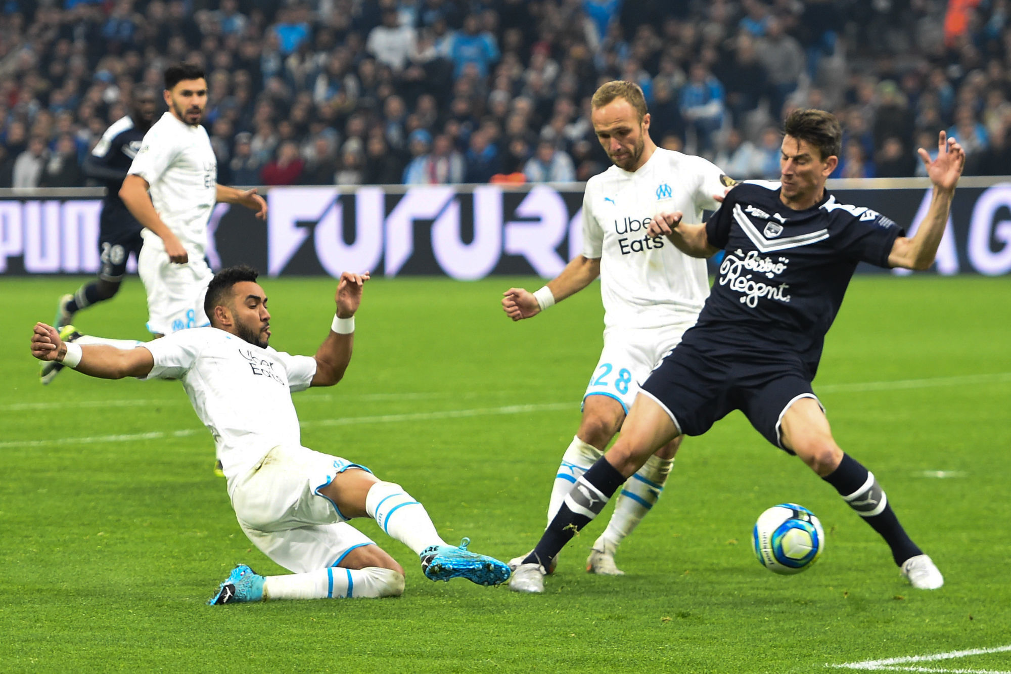 Dimitri Payet of Marseille and Valere Germain of Marseille and Laurent KOSCIELNY of Bordeaux  during the Ligue 1 match between Olympique Marseille and Girondins Bordeaux at Stade Velodrome on December 7, 2019 in Marseille, France. (Photo by Alexandre Dimou/Icon Sport) - Orange Vélodrome - Marseille (France)