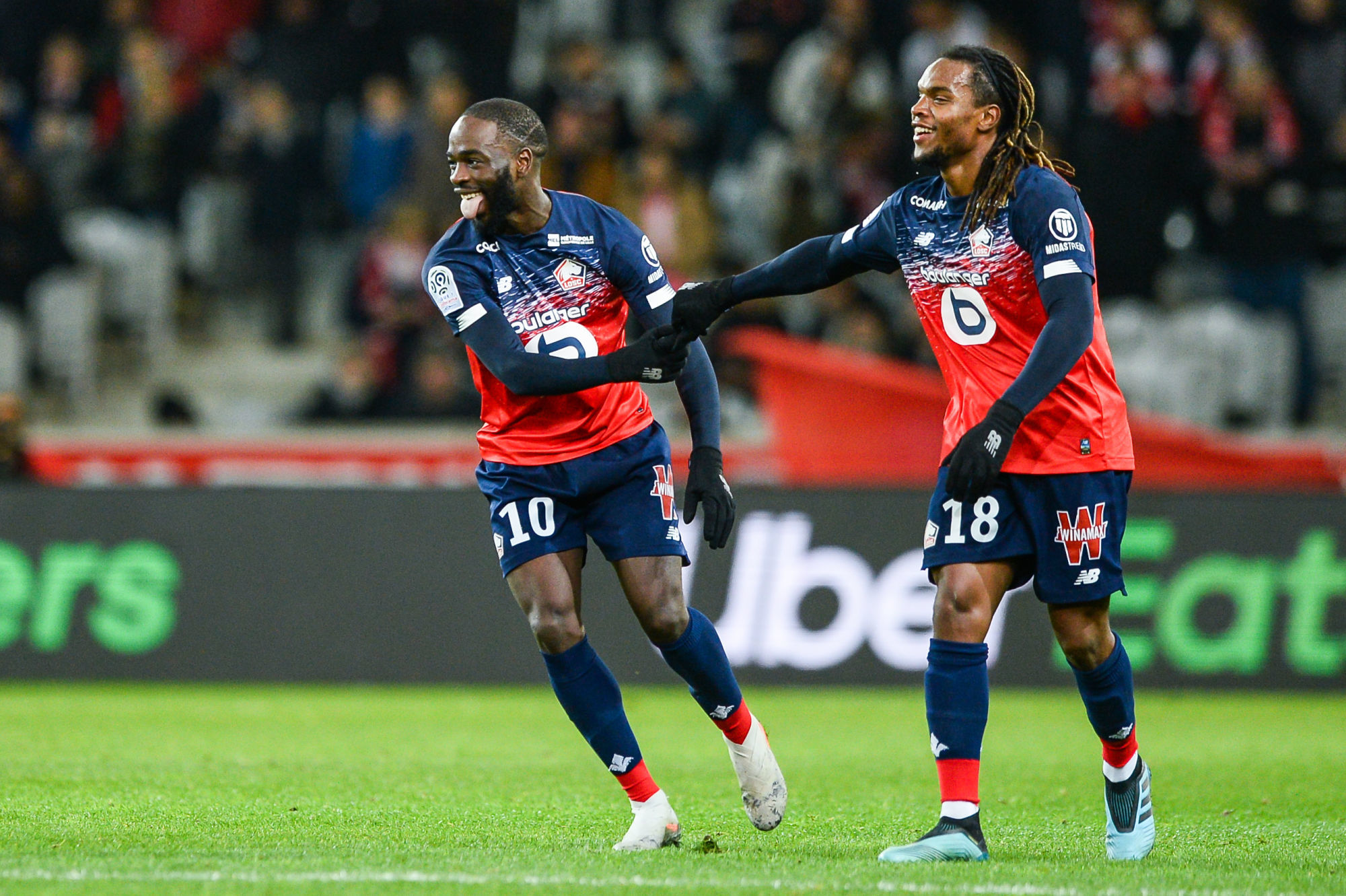 Jonathan IKONE of Lille celebrates his goal with Renato SANCHES of Lille  during the French Ligue 1 soccer match between Lille OSC and Montpellier HSC at Stade Pierre Mauroy on December 13, 2019 in Lille, France. (Photo by Baptiste Fernandez/Icon Sport) - Stade Pierre Mauroy - Lille (France)