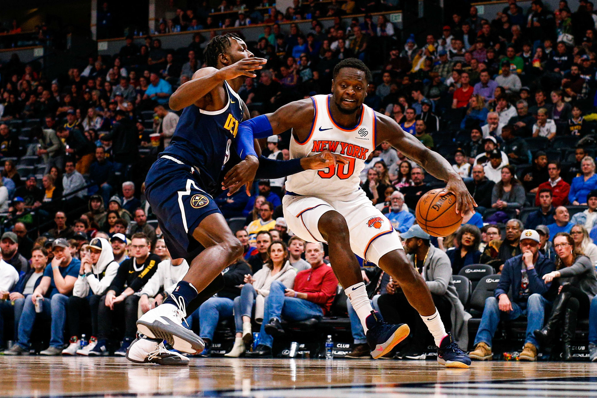 Dec 15, 2019; Denver, CO, USA; New York Knicks forward Julius Randle (30) dribbles the ball as Denver Nuggets forward Jerami Grant (9) defends in the third quarter at the Pepsi Center. Mandatory Credit: Isaiah J. Downing-USA TODAY Sports/Sipa USA 

Photo by Icon Sport - Jerami GRANT - Julius RANDLE - Pepsi Center - Denver (Etats Unis)