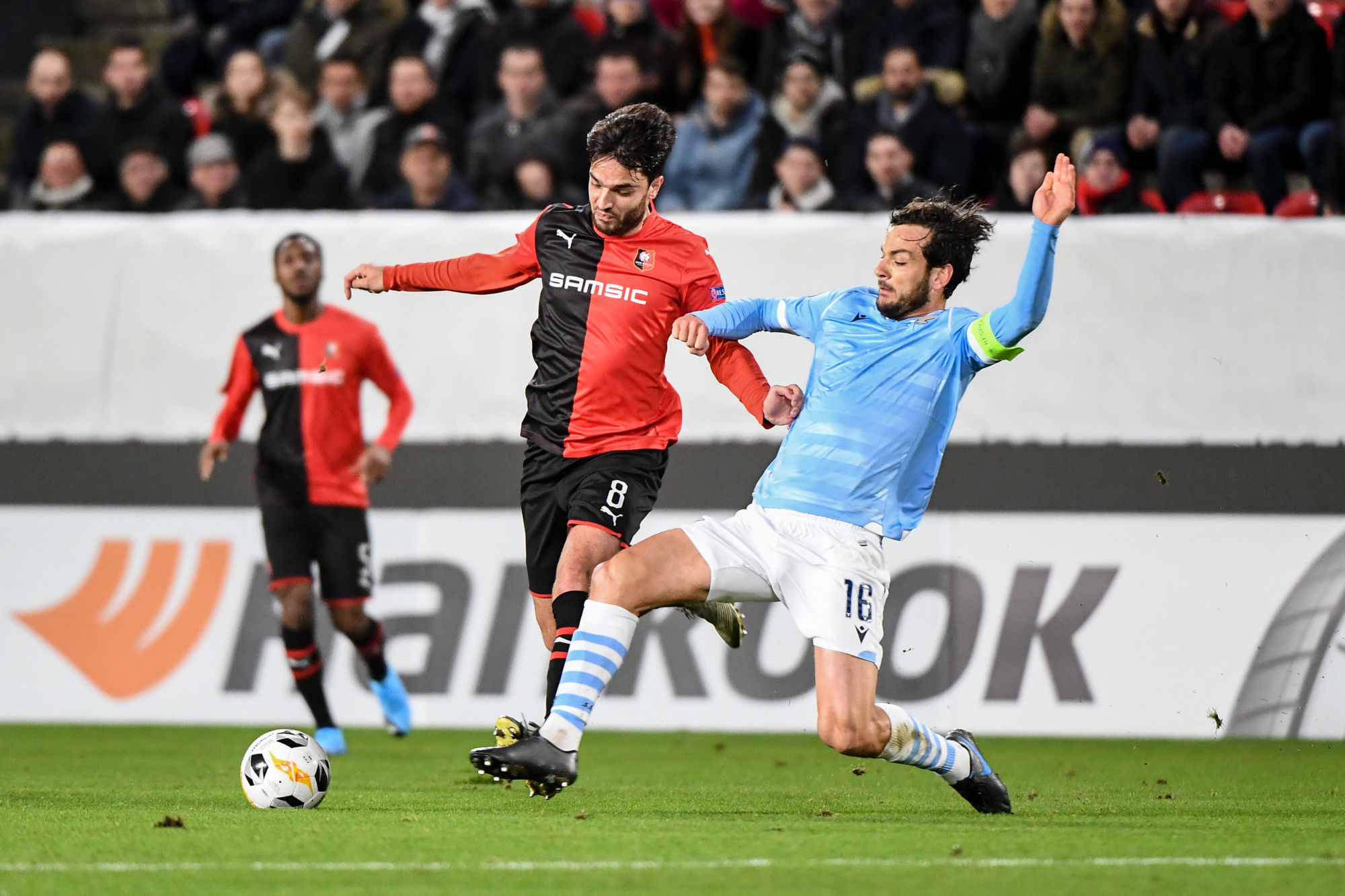 Clement GRENIER of Rennes and Marco PAROLO of Lazio during the Europa League match between Rennes and Lazio Rome at Roazhon Park on December 12, 2019 in Rennes, France. (Photo by Anthony Dibon/Icon Sport) - Roazhon Park - Rennes (France)