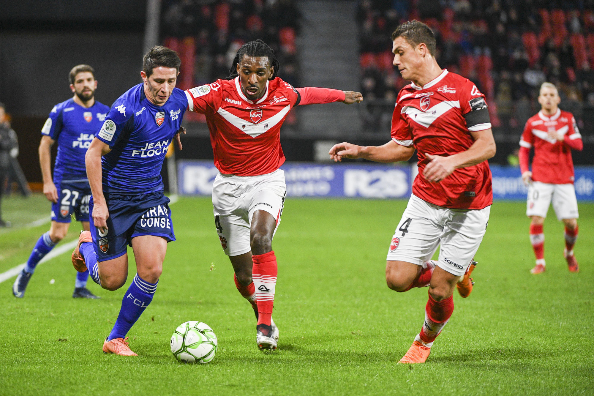 Jimmy CABOT of Lorient, and Lilian BRASSIER and Joffrey CUFFAUT of Valenciennes during the Ligue 2 match between Valenciennes and Lorient at Stade du Hainaut on December 20, 2019 in Valenciennes, France. (Photo by Aude Alcover/Icon Sport) - Stade du Hainaut - Valenciennes (France)