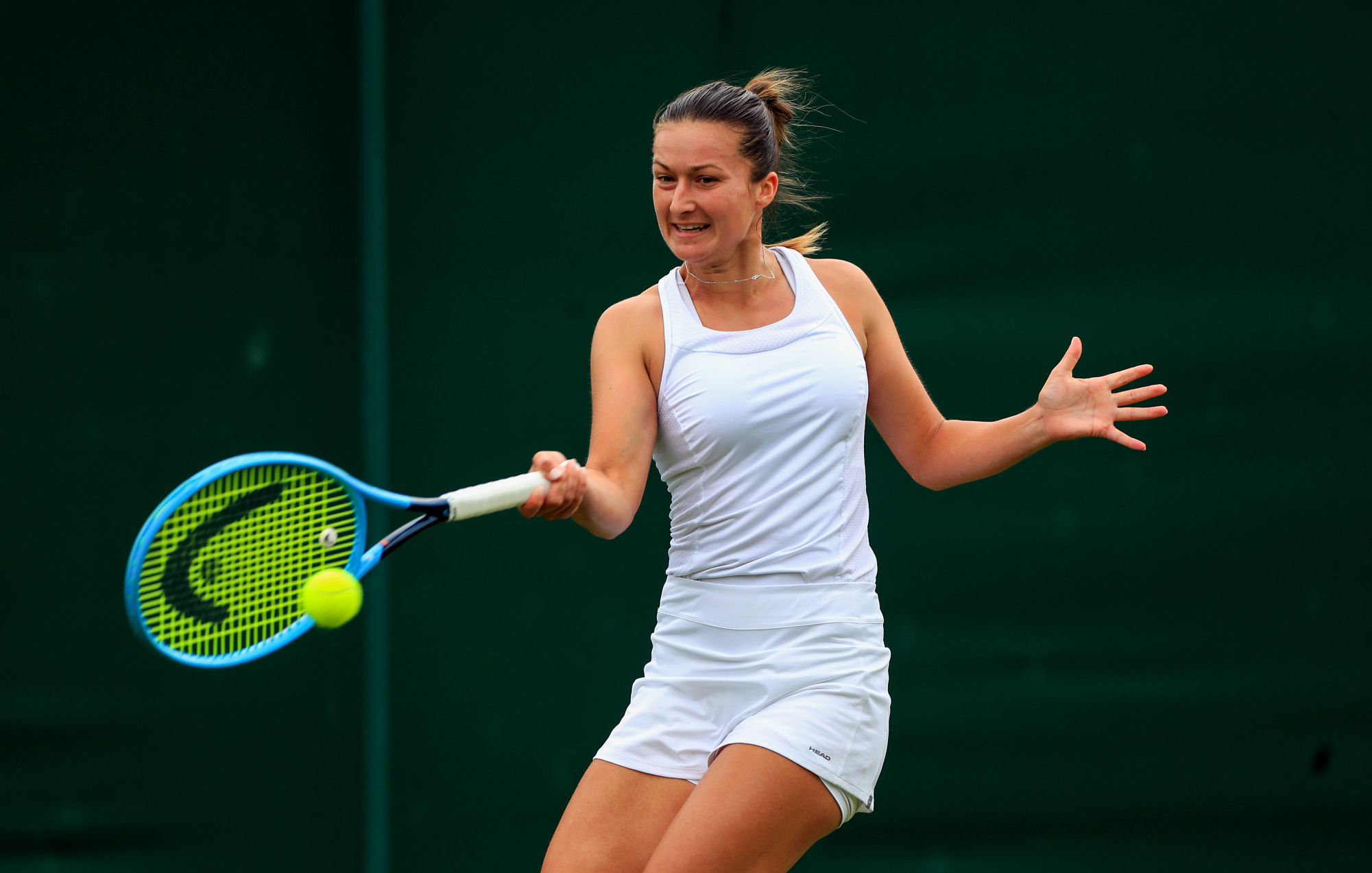 Dalila Jakupovic in action on day one of the Wimbledon Championships at the All England Lawn Tennis and Croquet Club, Wimbledon. 
Photo : PA Images / Icon Sport