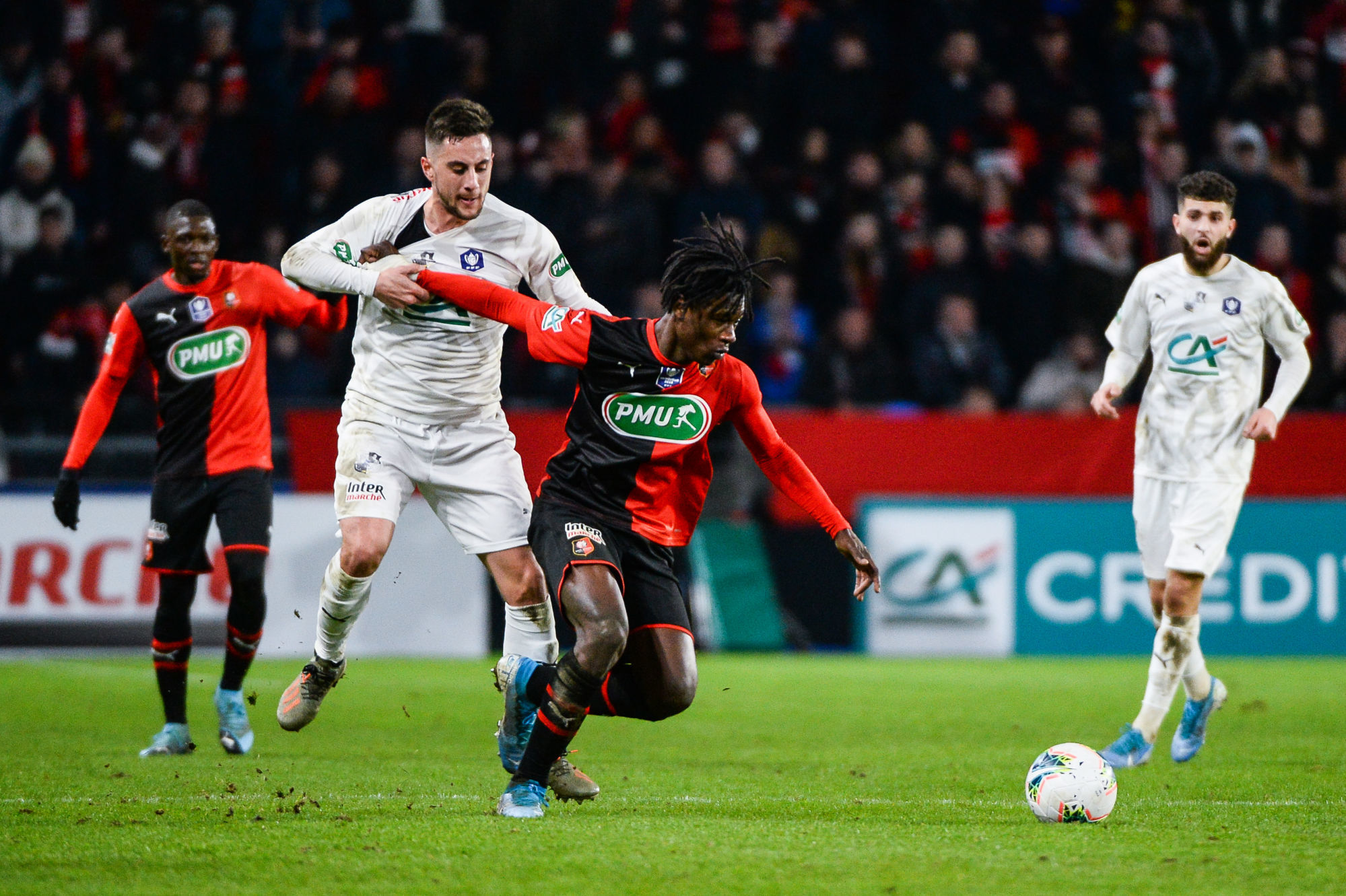 Quentin CORNETTE of Amiens and Eduardo CAMAVINGA of Rennes during the French Cup soccer match between Rennes and Amiens on January 4, 2020 in Rennes, France. (Photo by Baptiste Fernandez/Icon Sport) - Roazhon Park - Rennes (France)
