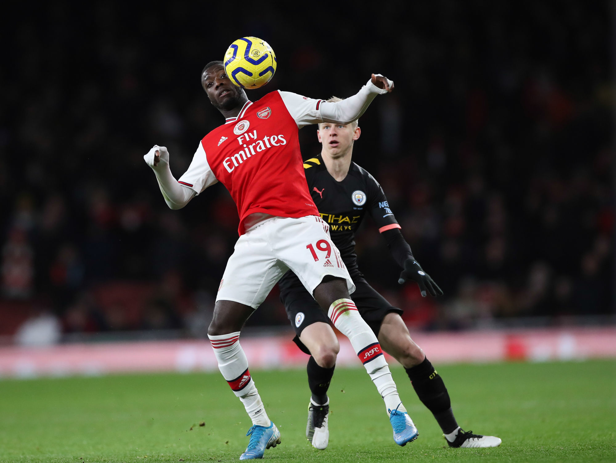 Nicolas Pepe of Arsenal and Oleksandr Zinchenko of Manchester City during the Premier League match at the Emirates Stadium, London. Picture date: 15th December 2019. Picture credit should read: David Klein/Sportimage 

Photo by Icon Sport - Nicolas PEPE - Oleksandr ZINCHENKO - Emirates Stadium - Londres (Angleterre)