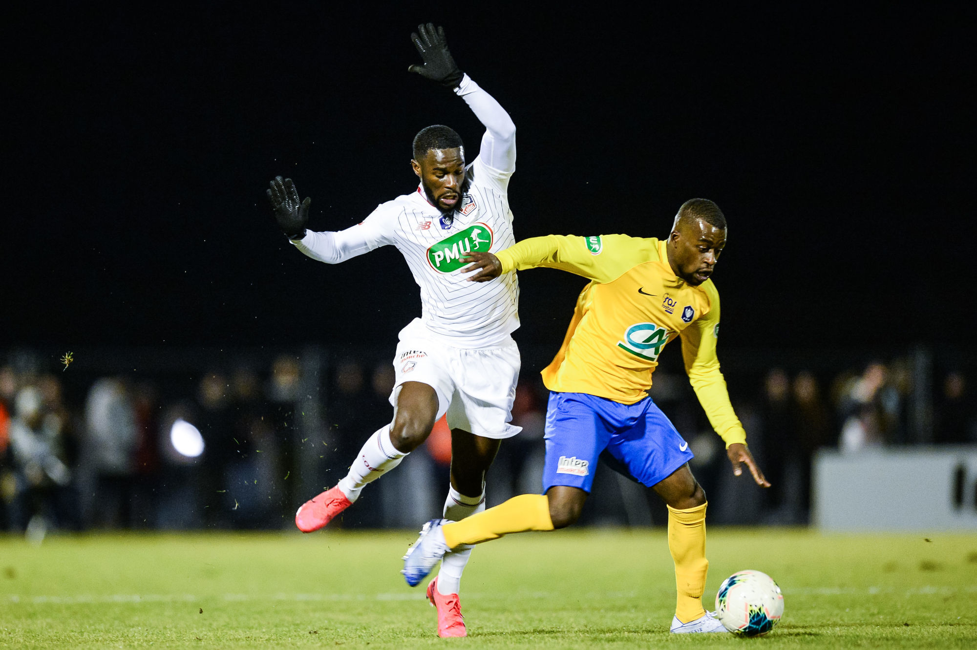 Jonathan BAMBA of Lille and David LUVUALU of Epinal during the French Cup soccer match between Epinal and Lille on January 29, 2020 in Epinal, France. (Photo by Baptiste Fernandez/Icon Sport)