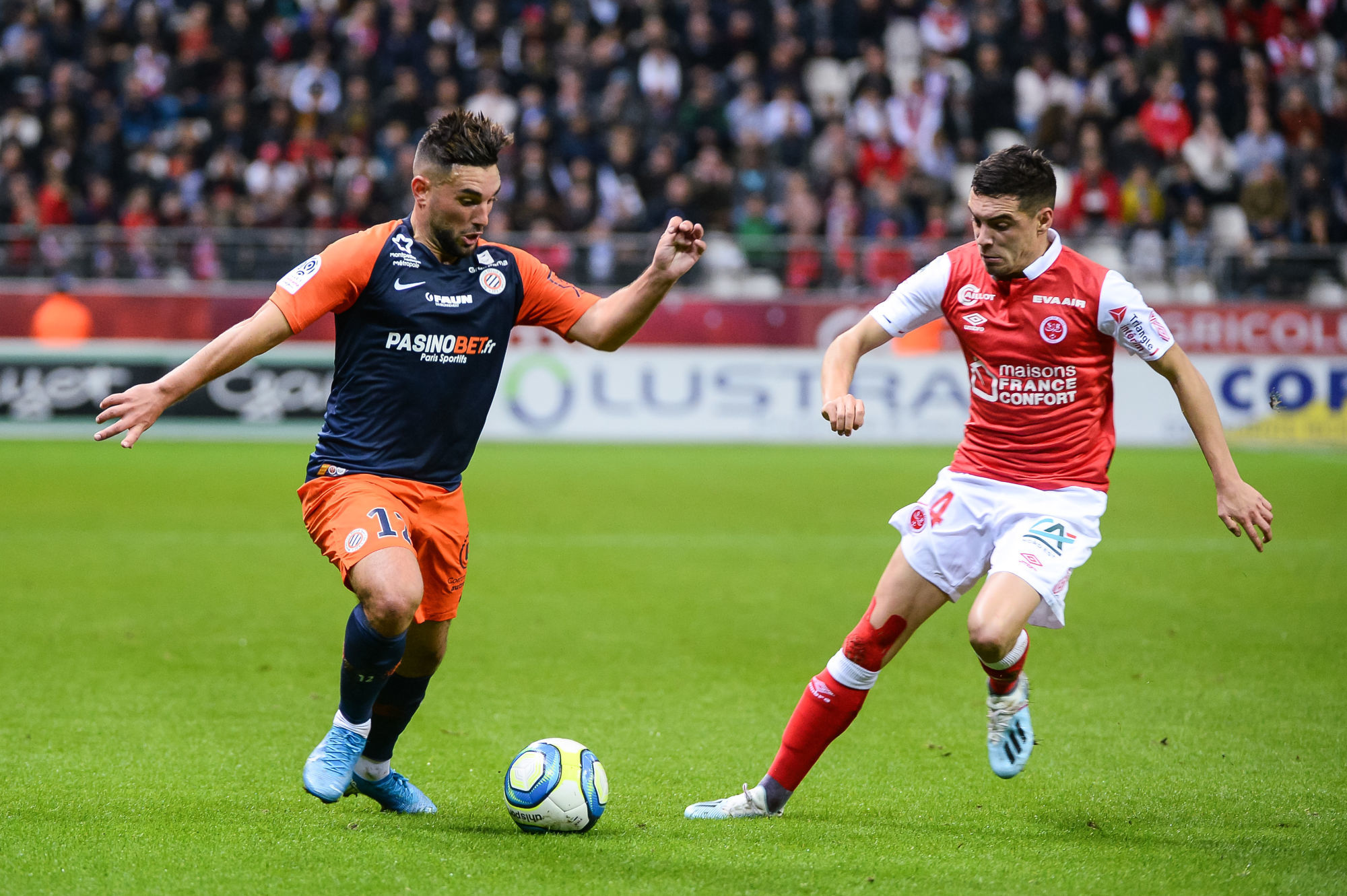 Jordan FERRI of Montpellier and Mathieu CAFARO of Reims during the French Ligue 1 football match between Stade de Reims and Montpellier HSC at Stade Auguste Delaune on October 19, 2019 in Reims, France. (Photo by Baptiste Fernandez/Icon Sport) - Jordan FERRI - Mathieu CAFARO - Stade Auguste-Delaune - Reims (France)