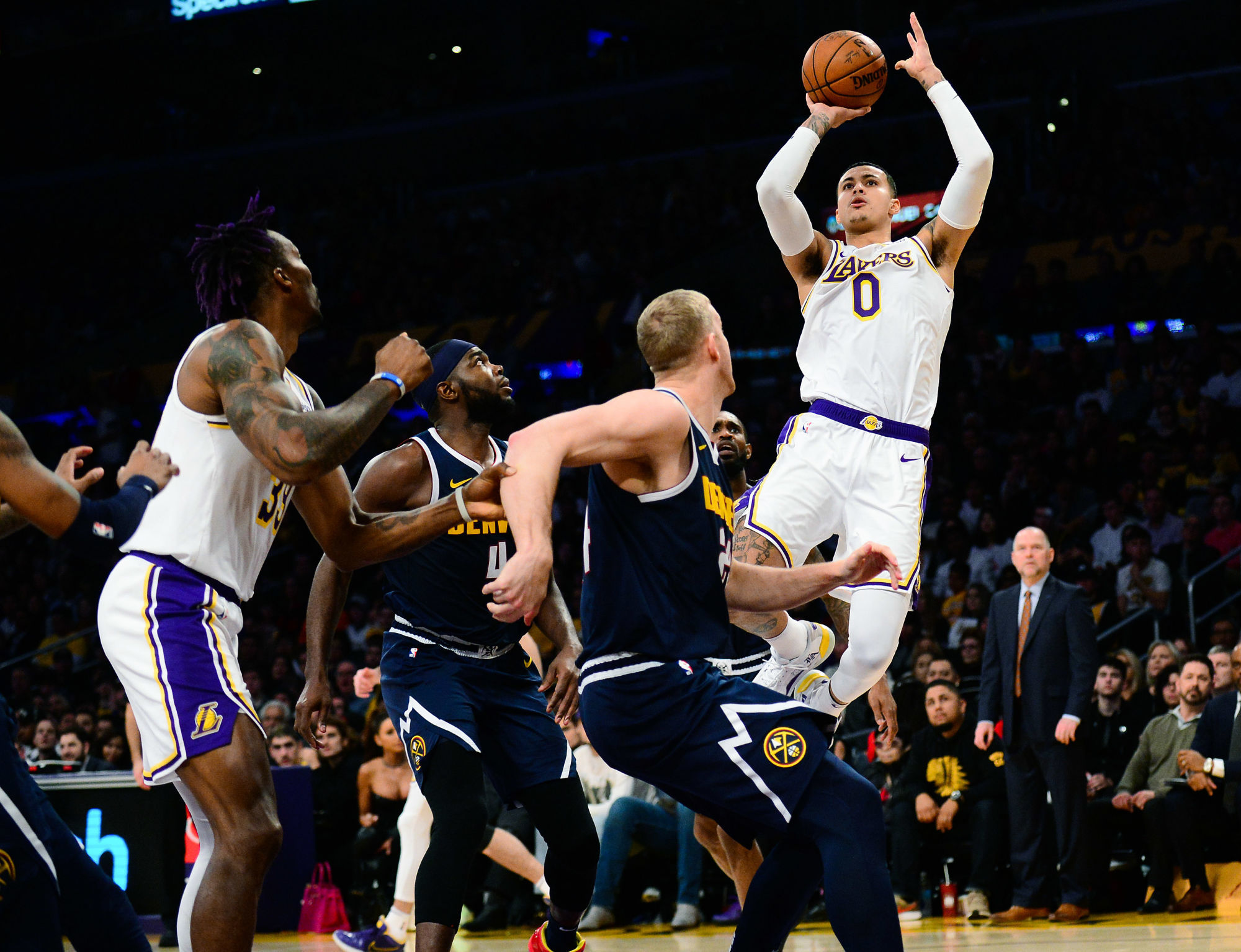 December 22, 2019; Los Angeles, California, USA; Los Angeles Lakers forward Kyle Kuzma (0) shoots against the Denver Nuggets during the second half at Staples Center. Mandatory Credit: Gary A. Vasquez-USA TODAY Sports/Sipa USA 

Photo by Icon Sport - Kyle KUZMA