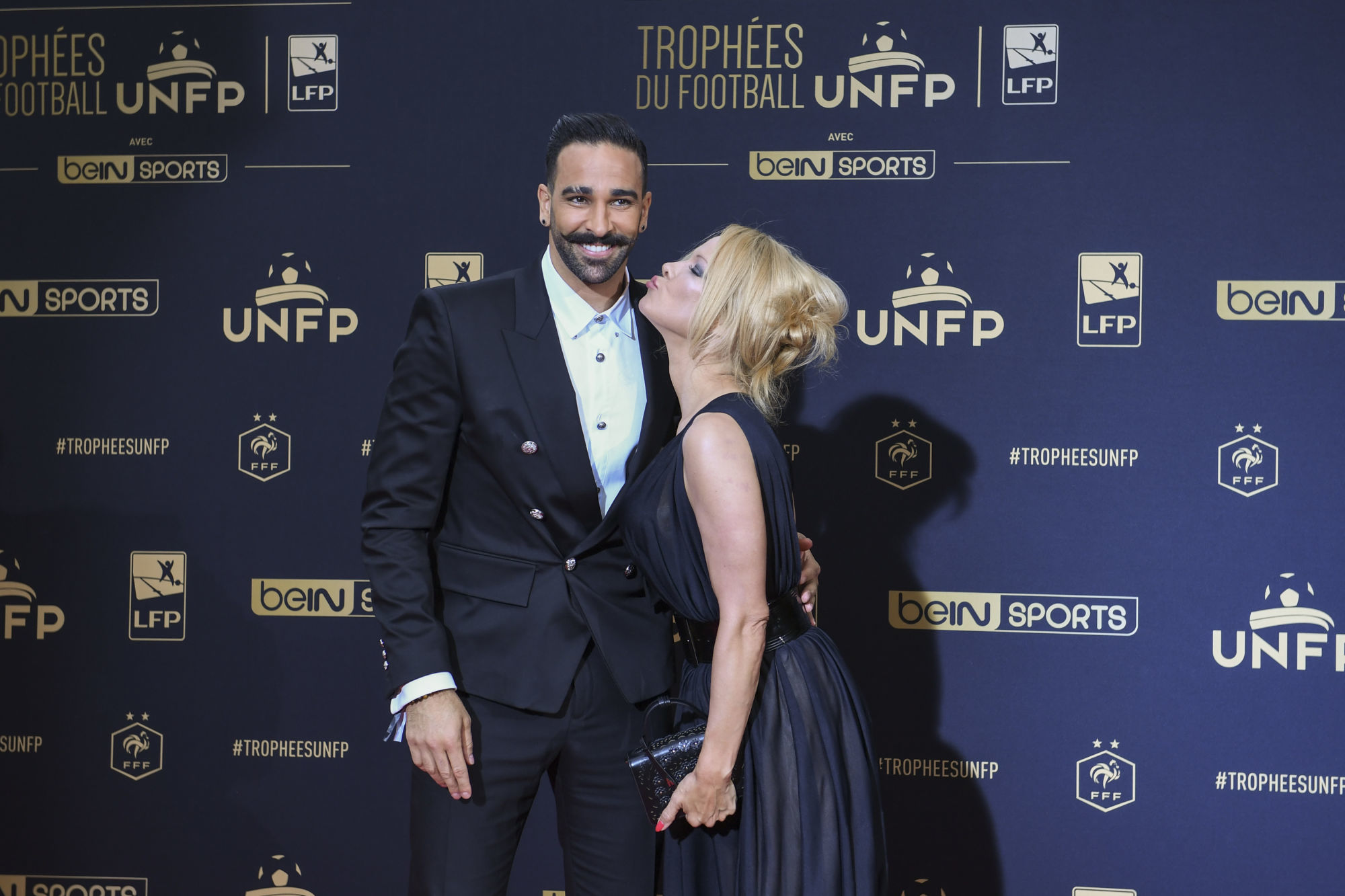 Adil Rami of Marseille and Pamela Anderson during the UNFP Trophy 2019 at Studio Gabriel on May 19, 2019 in Paris, France. (Photo by Aude Alcover/Icon Sport)