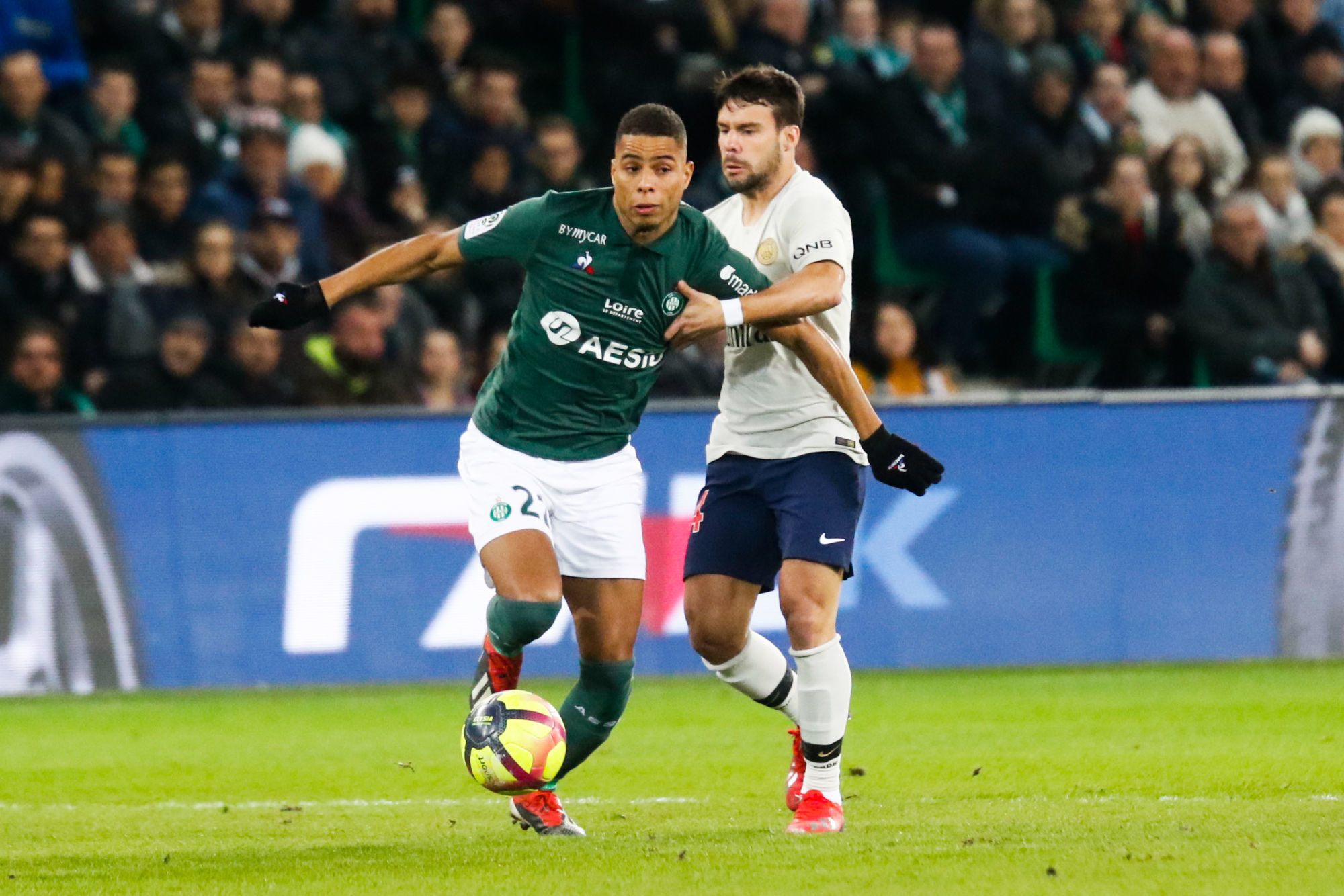 Monnet Paquet Kevin of Saint Etienne and Bernat Velasco Juan of Paris during the Ligue 1 match between Saint Etienne and Paris Saint Germain at Stade Geoffroy-Guichard on February 17, 2019 in Saint-Etienne, France. (Photo by Romain Biard/Icon Sport)