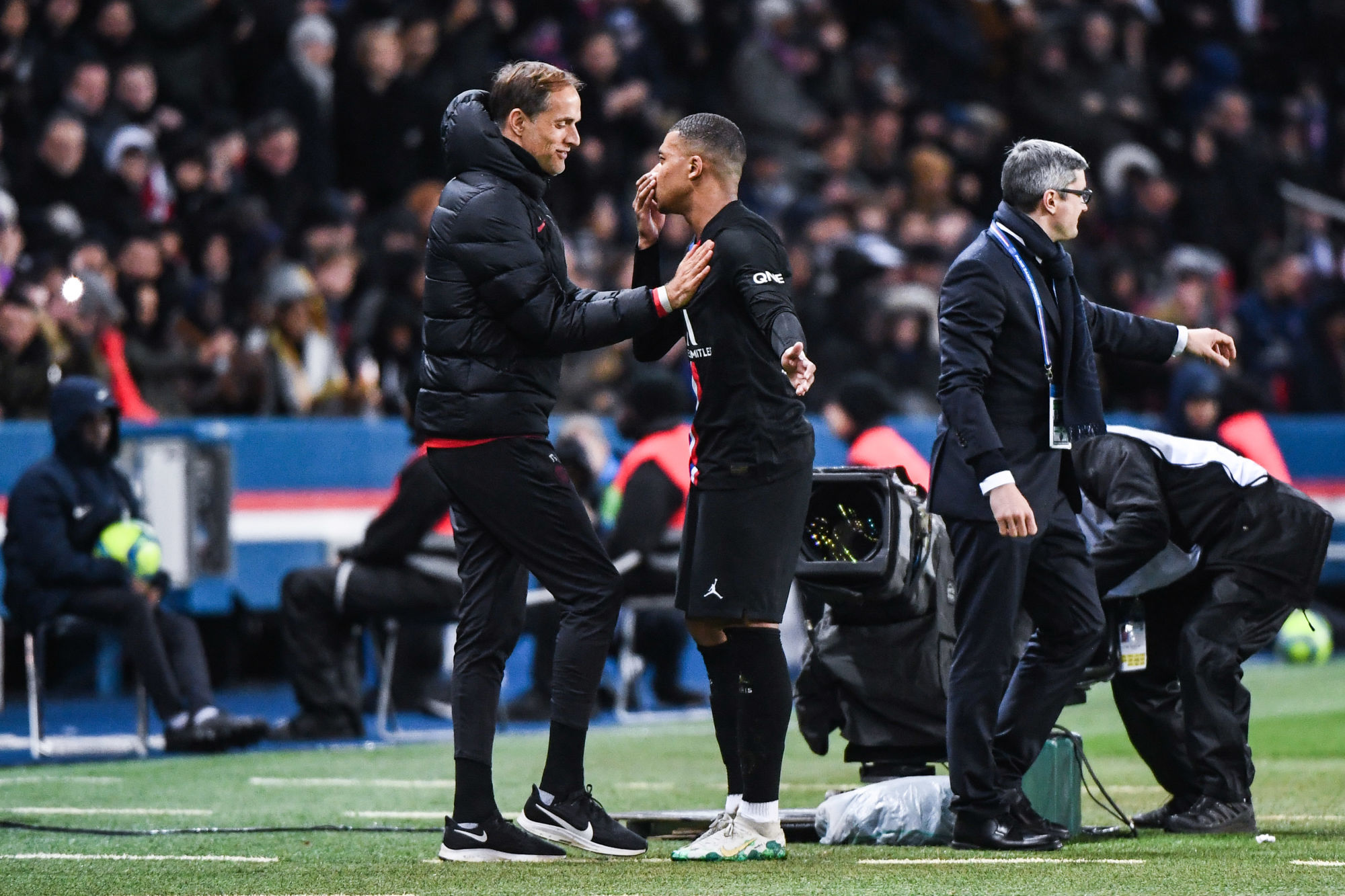 Kylian MBAPPE of PSG talks with Thomas TUCHEL coach of PSG during the Ligue 1 match between Paris and Montpellier at Parc des Princes on February 1, 2020 in Paris, France. (Photo by Anthony Dibon/Icon Sport) - Thomas TUCHEL - Kylian MBAPPE - Parc des Princes - Paris (France)