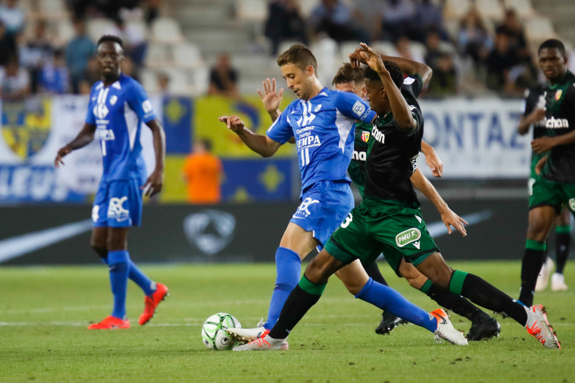 Benet Jessy of Grenoble and and Banza Simon Bokote of Lens during the Ligue 2 match between Grenoble and Lens at Stade des Alpes on September 2, 2019 in Grenoble, France. (Photo by Romain Biard/Icon Sport) - Jessy BENET