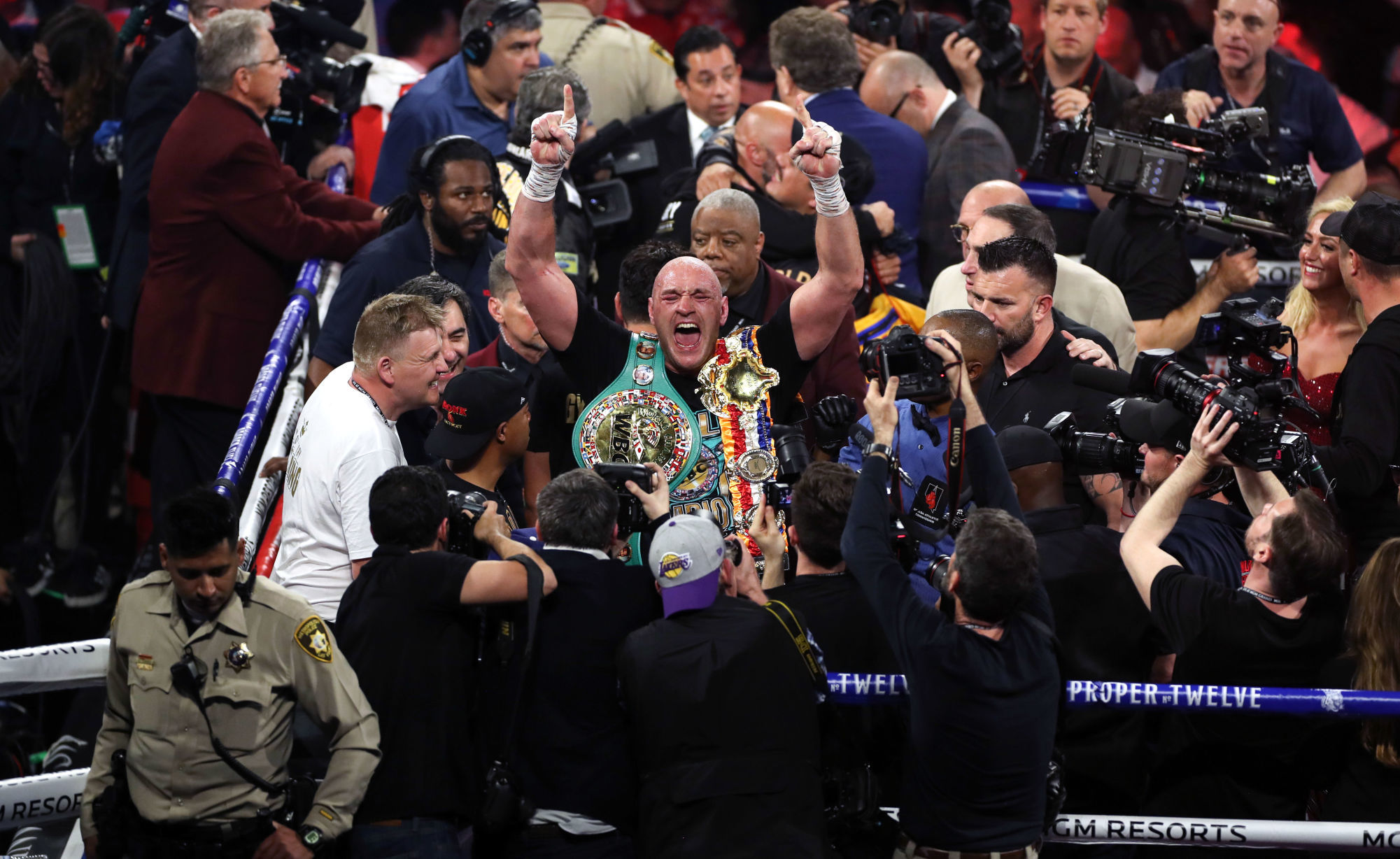 Tyson Fury (centre) celebrates defeating Deontay Wilder in the World Boxing Council World Heavy Title bout at the MGM Grand, Las Vegas. 

Photo by Icon Sport - MGM Grand Garden Arena - Las Vegas (Etats Unis)