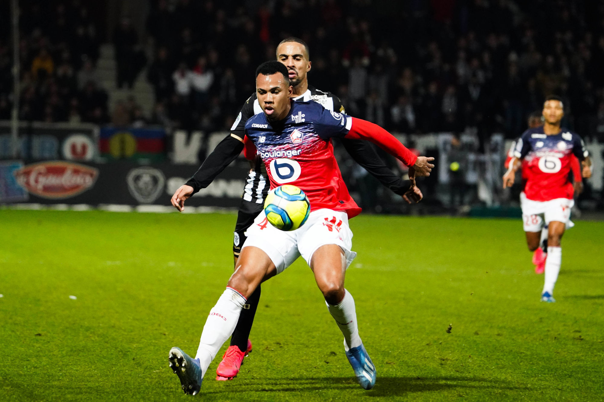 GABRIEL of Lille and Rachid ALIOUI of Angers during the Ligue 1 match between Angers SCO and Lille OSC at Stade Raymond Kopa on February 7, 2020 in Angers, France. (Photo by Eddy Lemaistre/Icon Sport) - Stade Raymond Kopa - Angers (France)