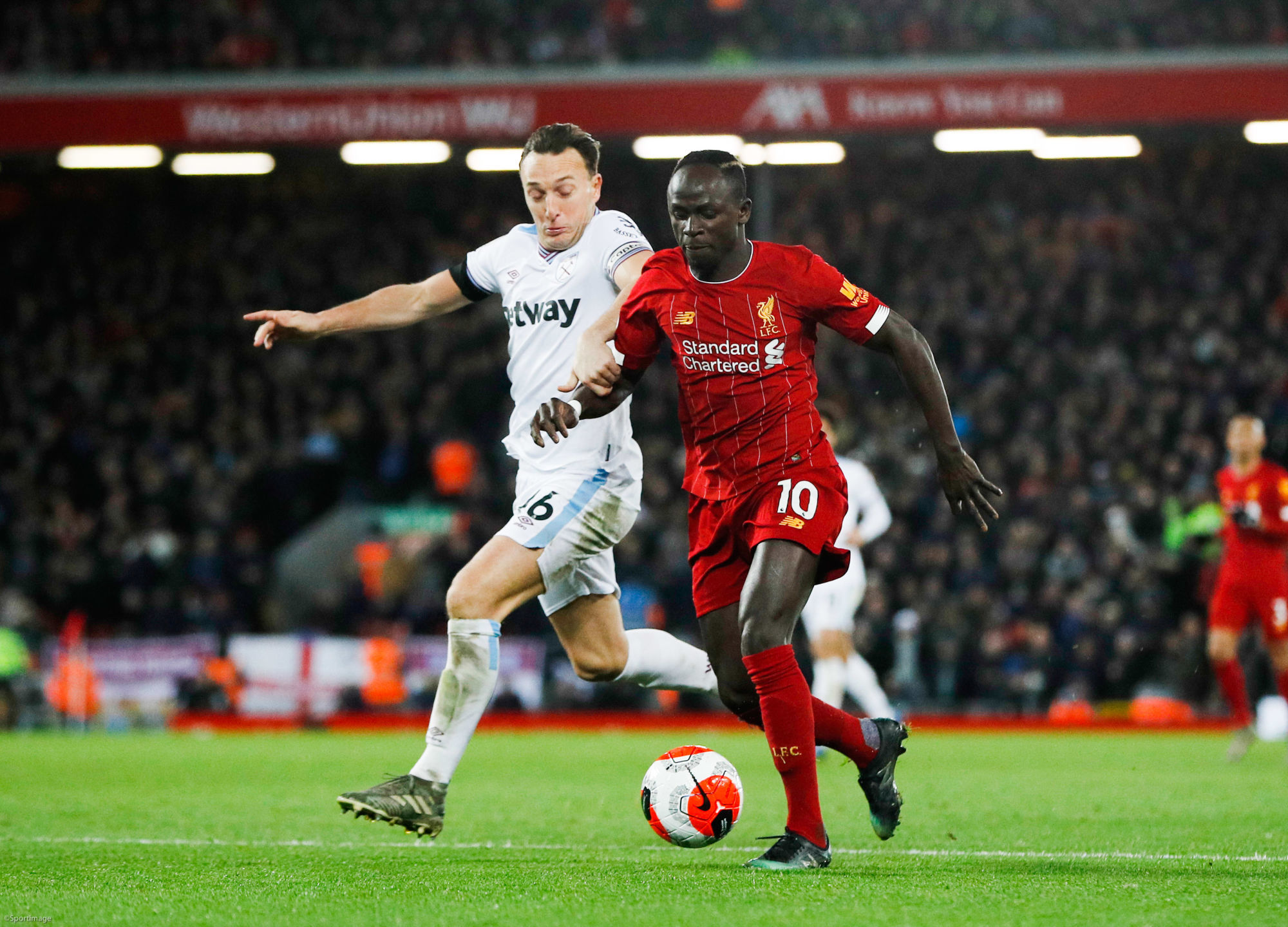 Sadio Mane of Liverpool tackled by Mark Noble of West Ham United  during the Premier League match at Anfield, Liverpool. Picture date: 24th February 2020. Picture credit should read: Darren Staples/Sportimage 

Photo by Icon Sport - Anfield Road - Liverpool (Angleterre)