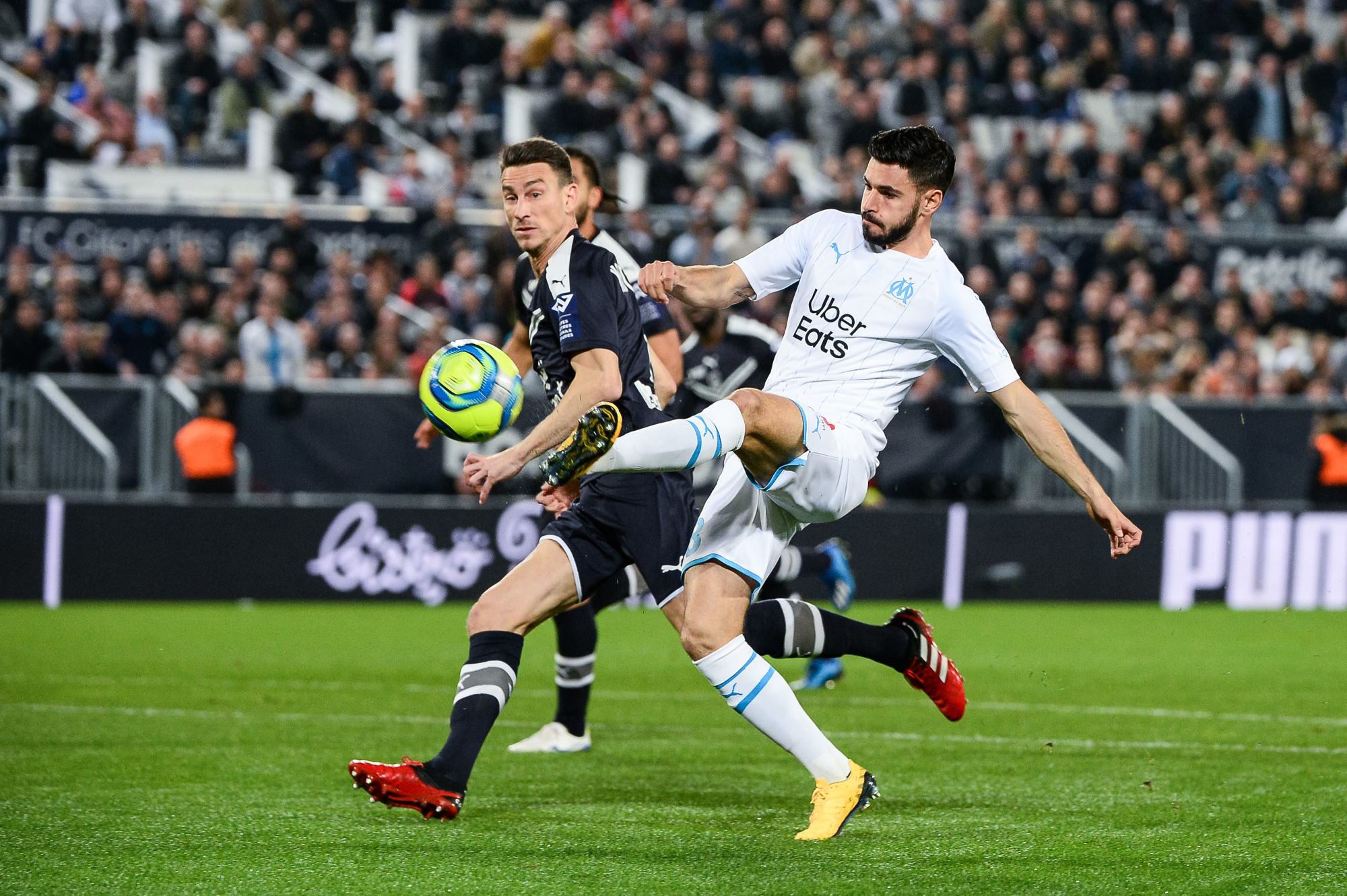 Laurent KOSCIELNY of Bordeaux and Morgan SANSON of Marseille during the French Ligue 1 Soccer match between Bordeaux and Marseille at Stade Matmut Atlantique on February 2, 2020 in Bordeaux, France. (Photo by Baptiste Fernandez/Icon Sport) - Matmut ATLANTIQUE - Bordeaux (France)