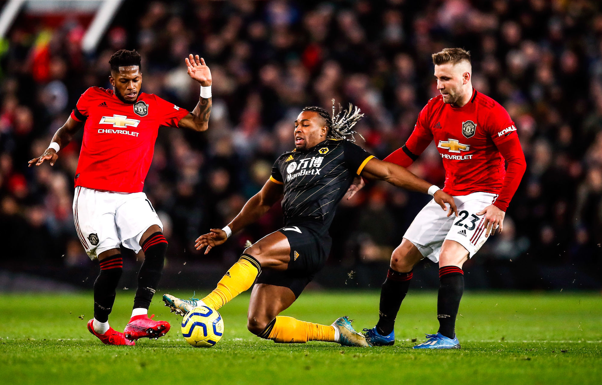 Wolverhampton Wanderers' Adama Traore battles for the ball with Manchester United's Fred (left) and Luke Shaw (right) during the Premier League match at Old Trafford, Manchester. 
Photo by Icon Sport - Old Trafford - Manchester (Angleterre)